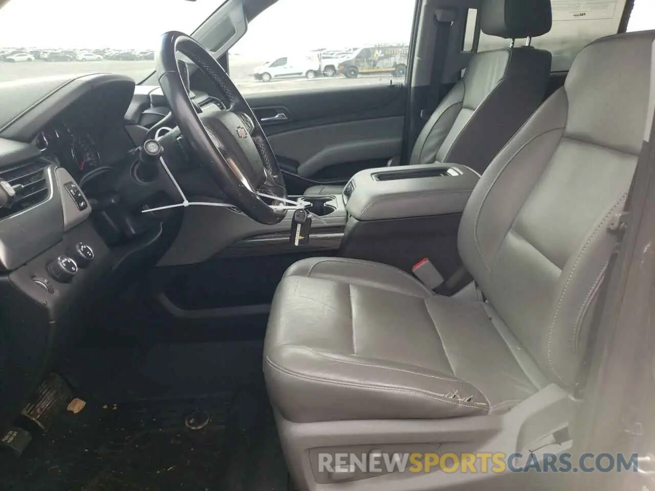 7 Photograph of a damaged car 1GNSKBKC3KR274580 CHEVROLET TAHOE 2019