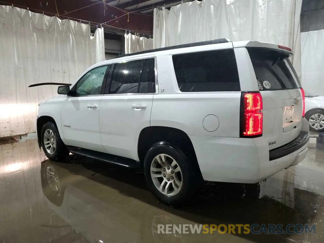 2 Photograph of a damaged car 1GNSKBKC3KR307481 CHEVROLET TAHOE 2019
