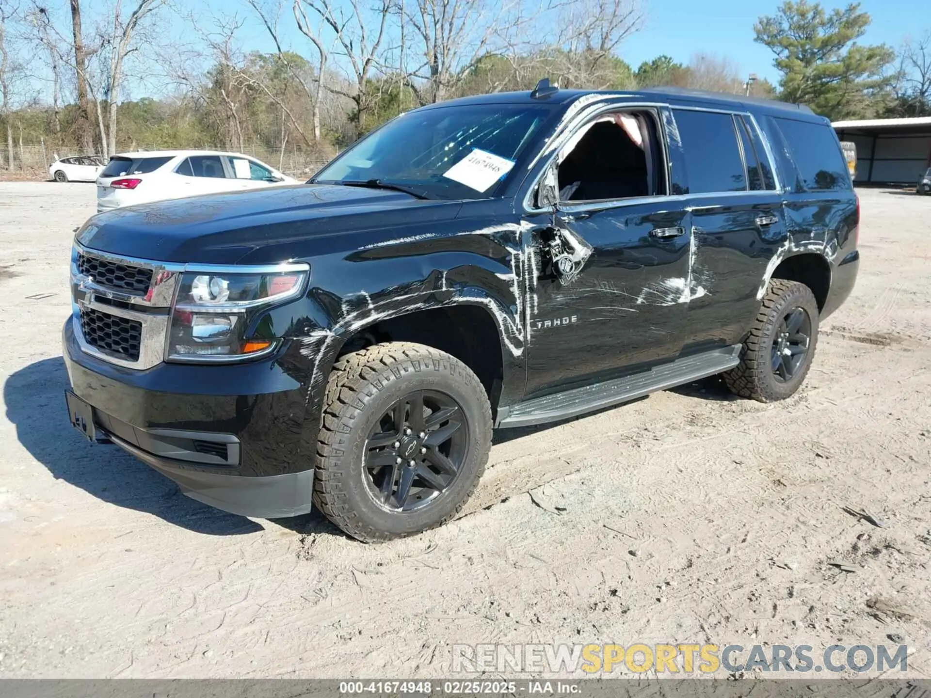 2 Photograph of a damaged car 1GNSKBKC3KR345776 CHEVROLET TAHOE 2019