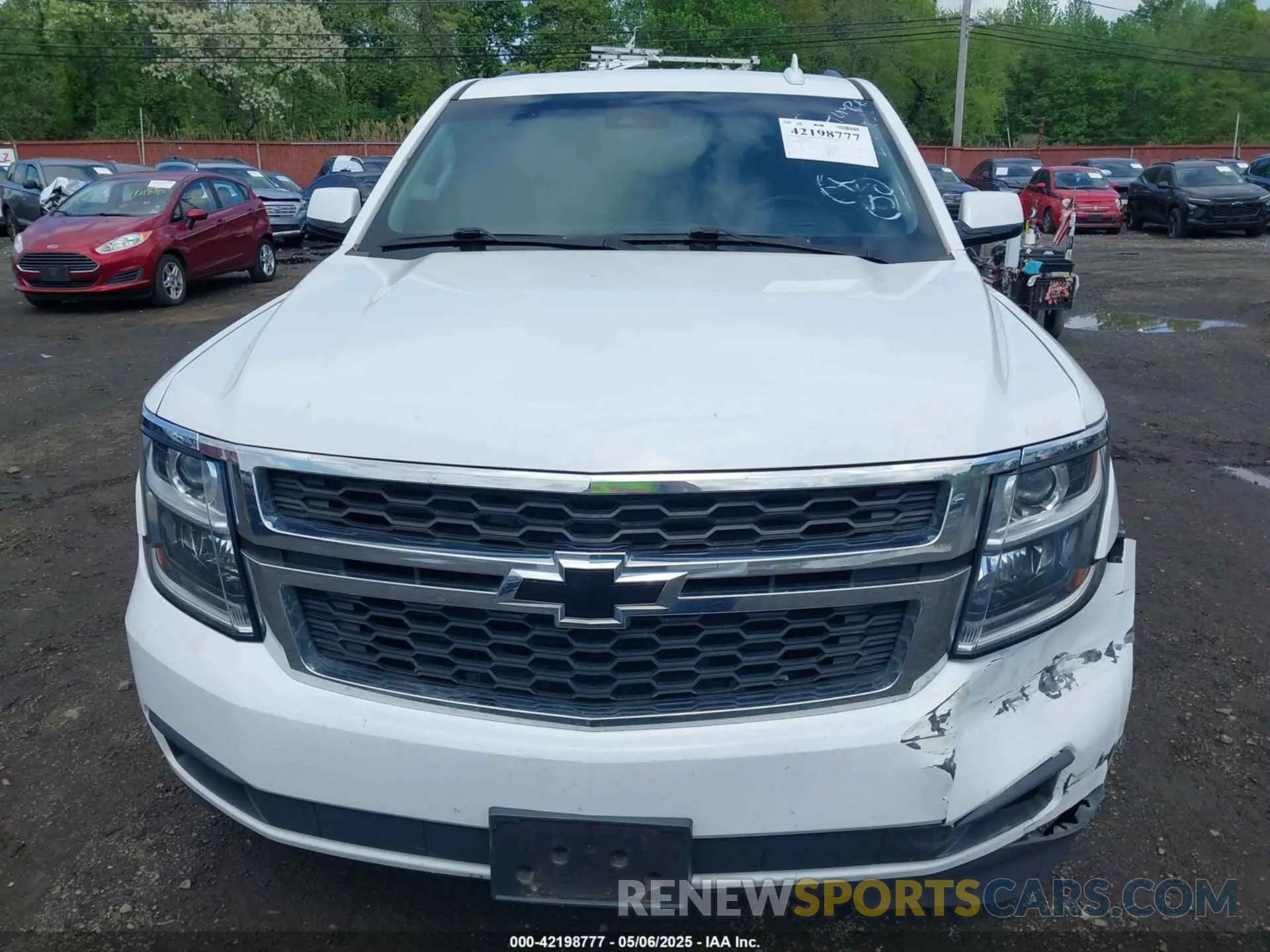12 Photograph of a damaged car 1GNSKBKC4KR341414 CHEVROLET TAHOE 2019