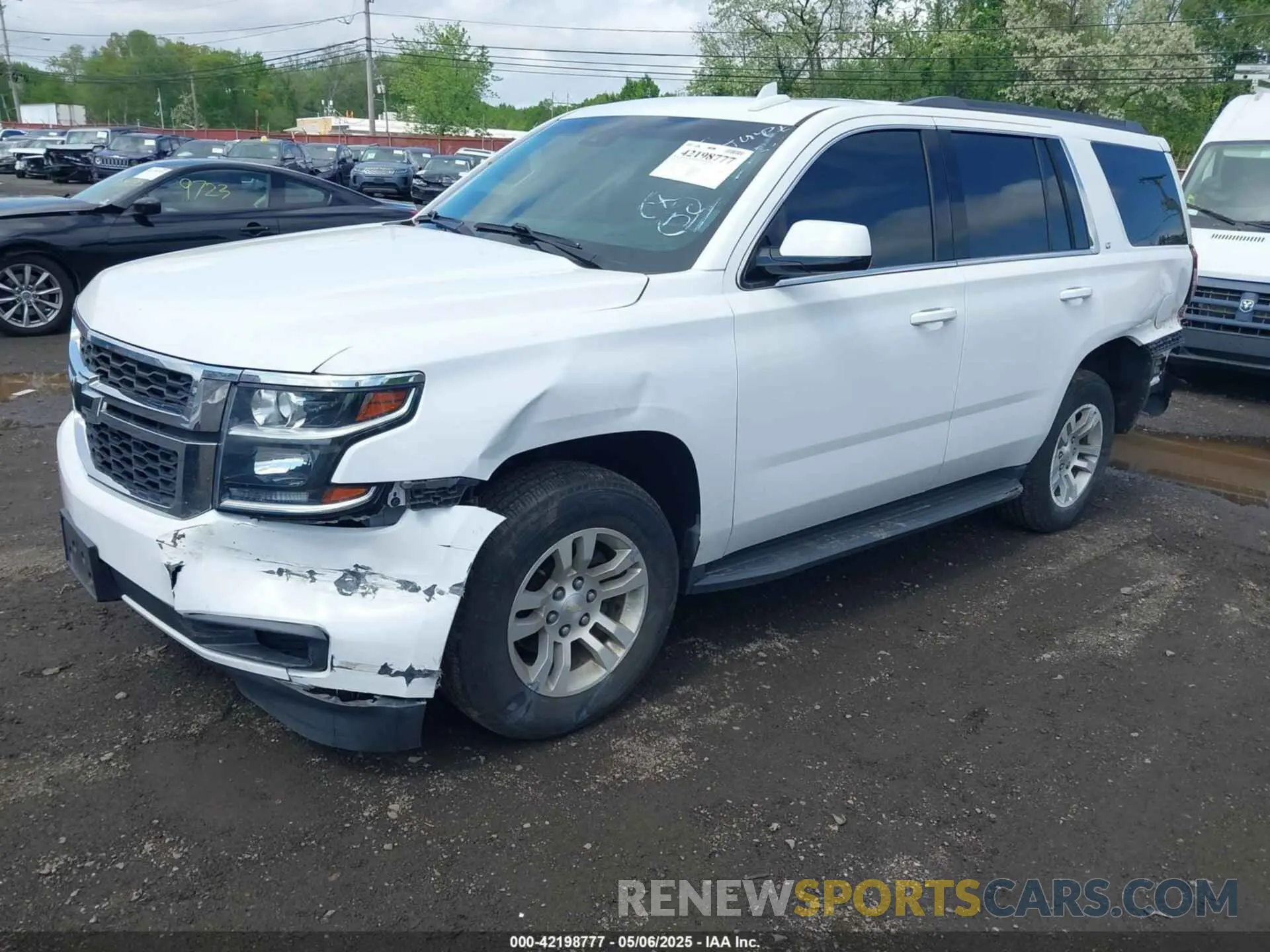 2 Photograph of a damaged car 1GNSKBKC4KR341414 CHEVROLET TAHOE 2019
