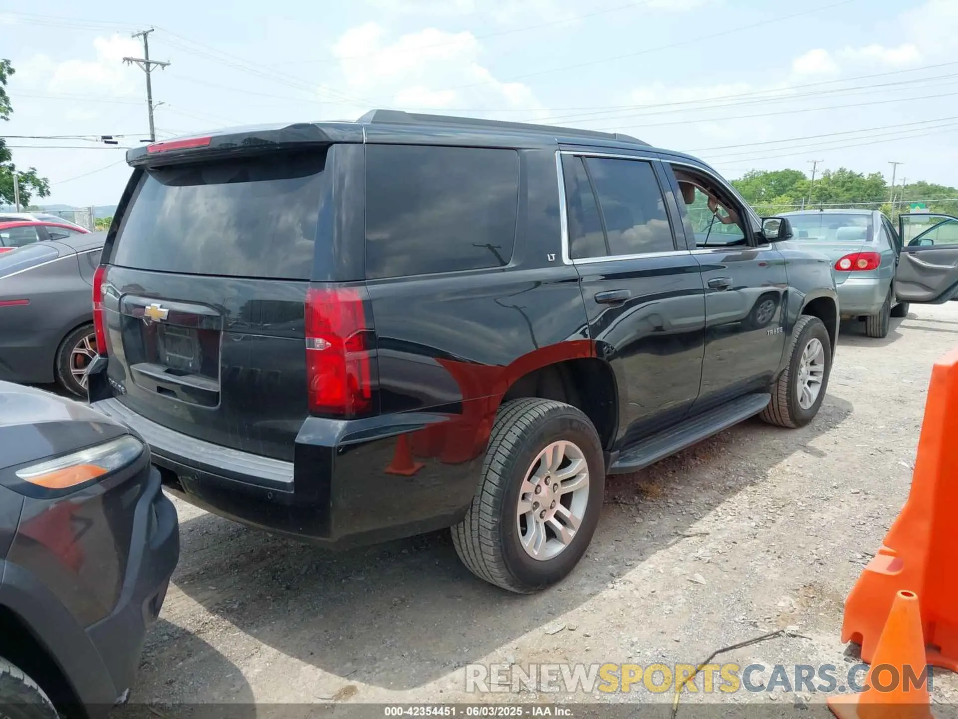 4 Photograph of a damaged car 1GNSKBKC5KR388869 CHEVROLET TAHOE 2019