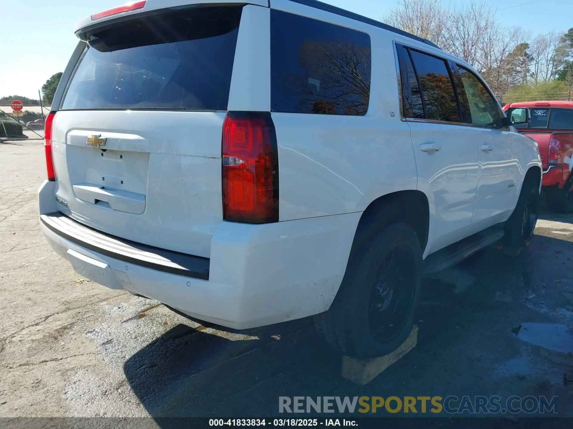 4 Photograph of a damaged car 1GNSKBKC7KR307869 CHEVROLET TAHOE 2019