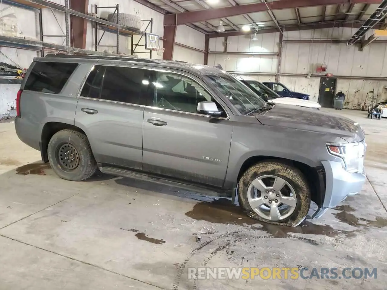 4 Photograph of a damaged car 1GNSKBKC7KR352620 CHEVROLET TAHOE 2019
