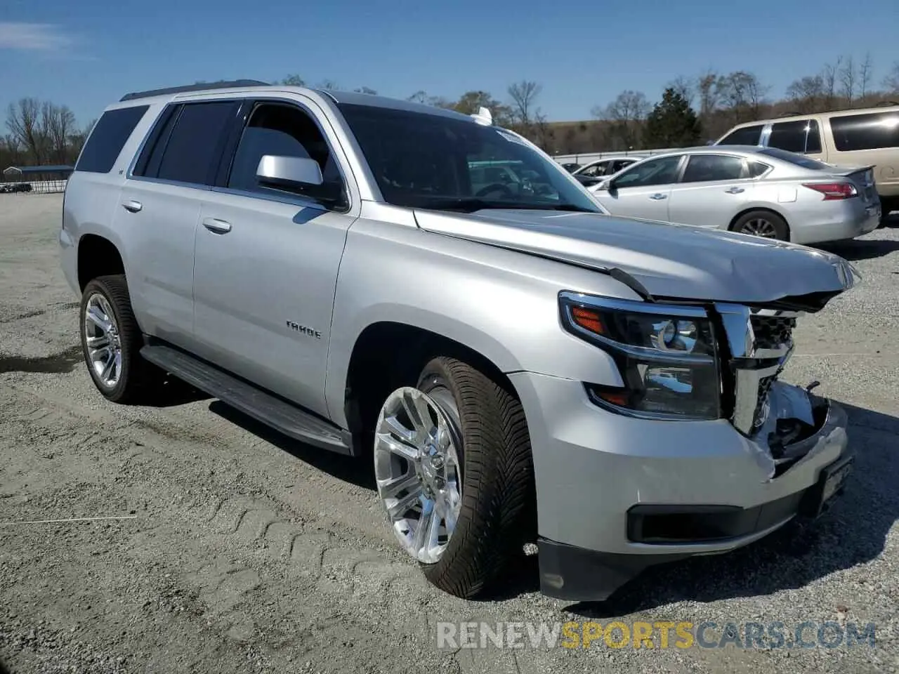 4 Photograph of a damaged car 1GNSKBKC7KR376724 CHEVROLET TAHOE 2019