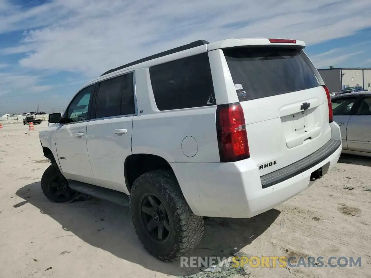 2 Photograph of a damaged car 1GNSKBKC7KR392177 CHEVROLET TAHOE 2019