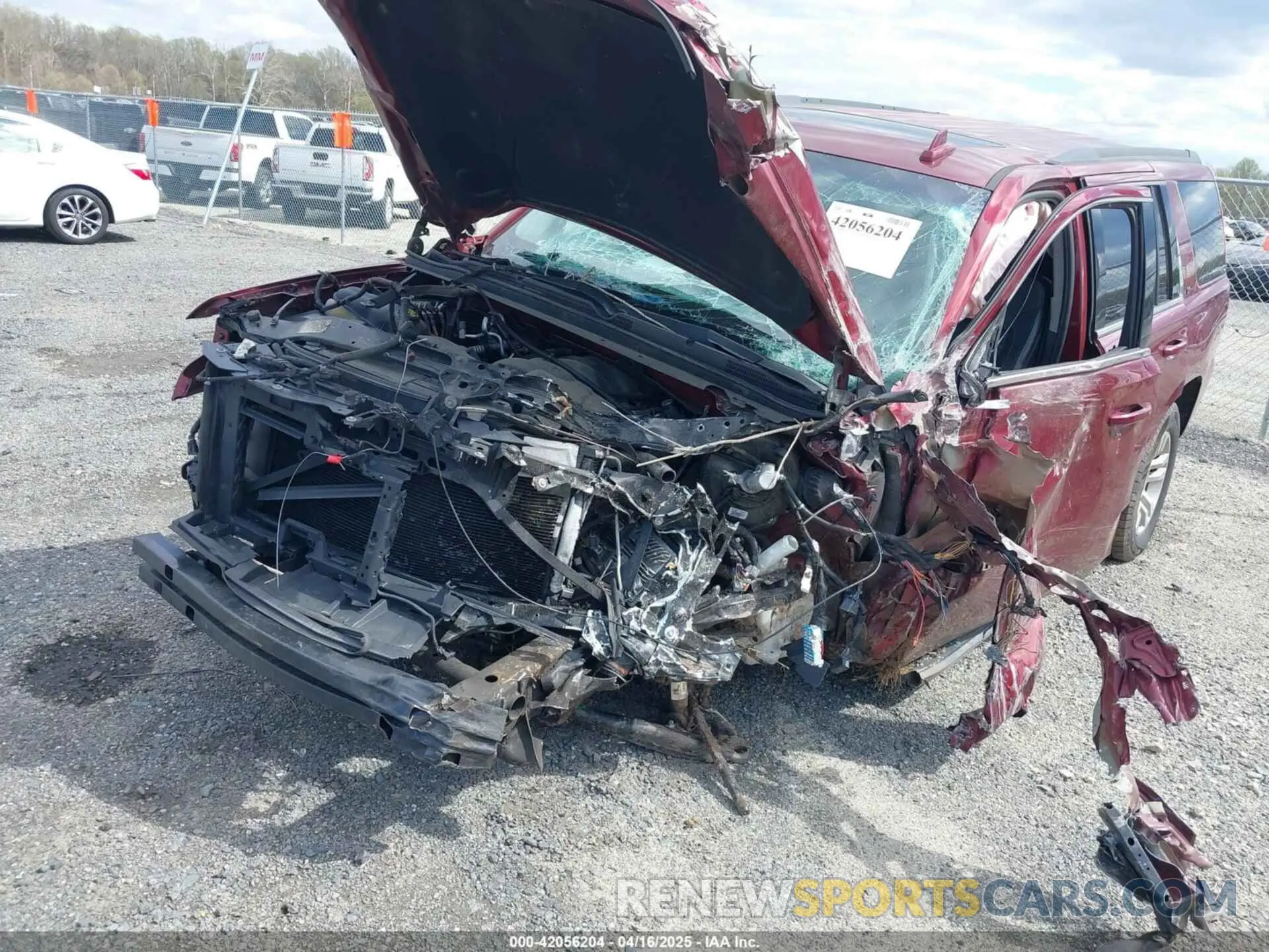 2 Photograph of a damaged car 1GNSKBKC8KR317570 CHEVROLET TAHOE 2019