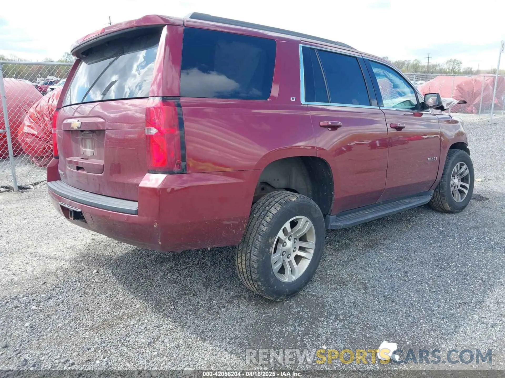 4 Photograph of a damaged car 1GNSKBKC8KR317570 CHEVROLET TAHOE 2019