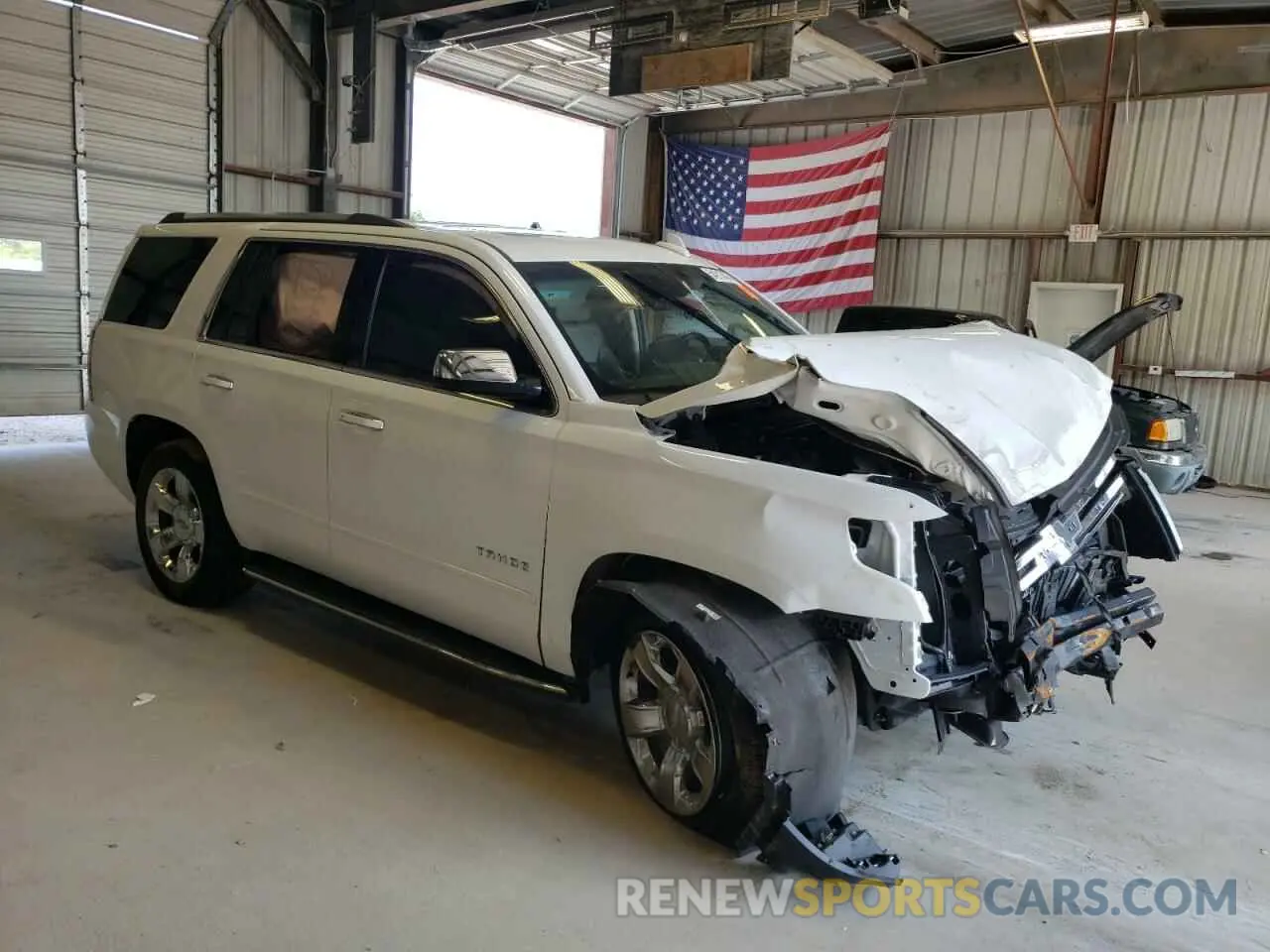4 Photograph of a damaged car 1GNSKCKC0KR148764 CHEVROLET TAHOE 2019