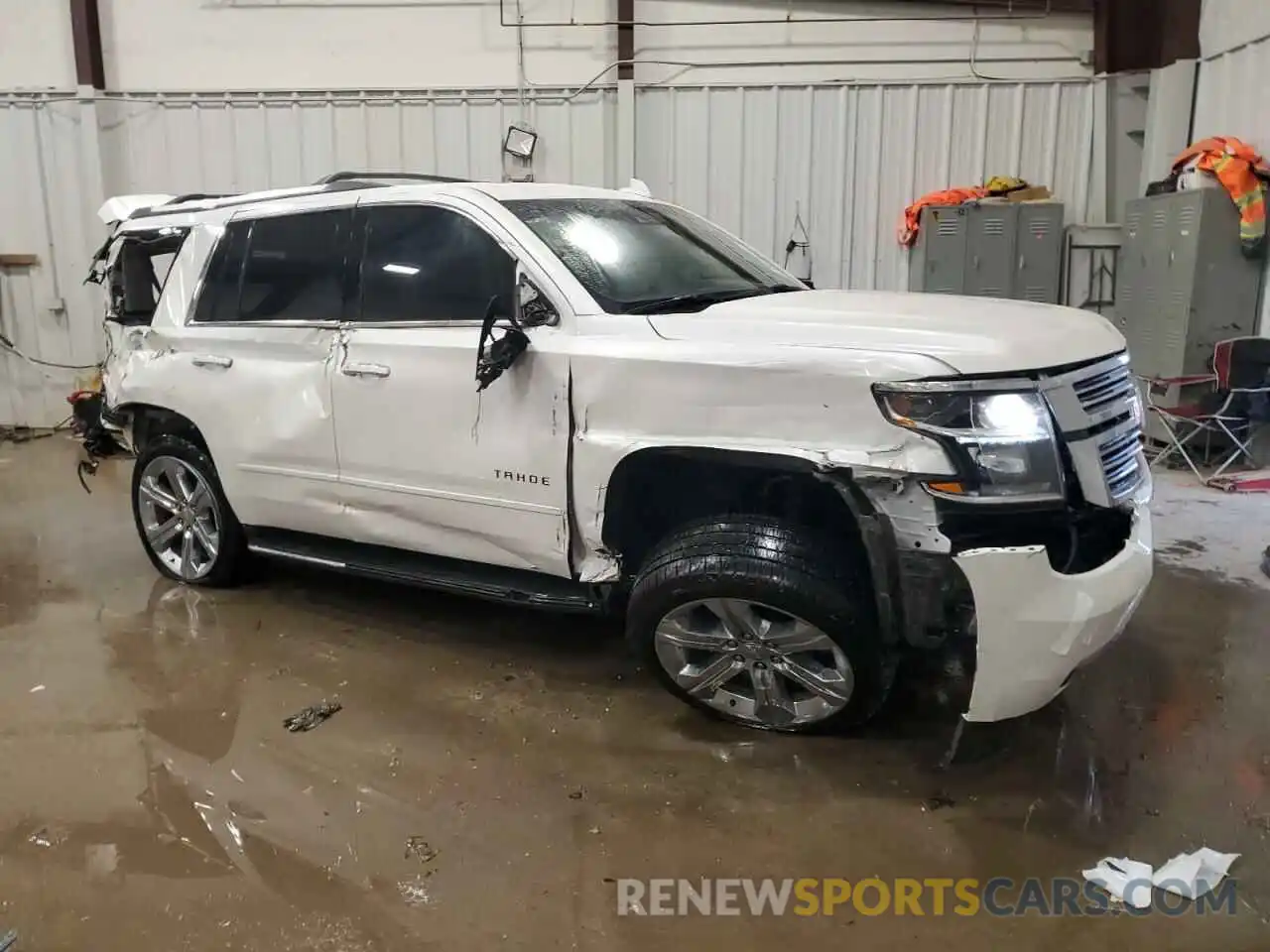 4 Photograph of a damaged car 1GNSKCKCXKR208663 CHEVROLET TAHOE 2019