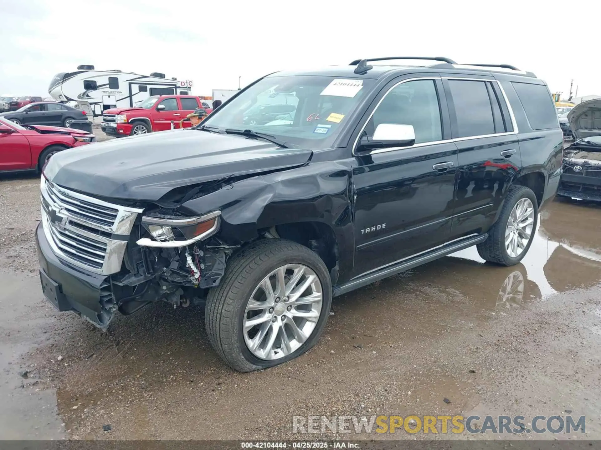 2 Photograph of a damaged car 1GNSKCKJ2KR242577 CHEVROLET TAHOE 2019
