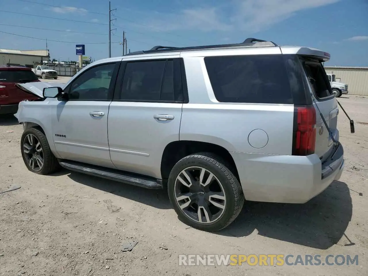 2 Photograph of a damaged car 1GNSKCKJ3KR295868 CHEVROLET TAHOE 2019