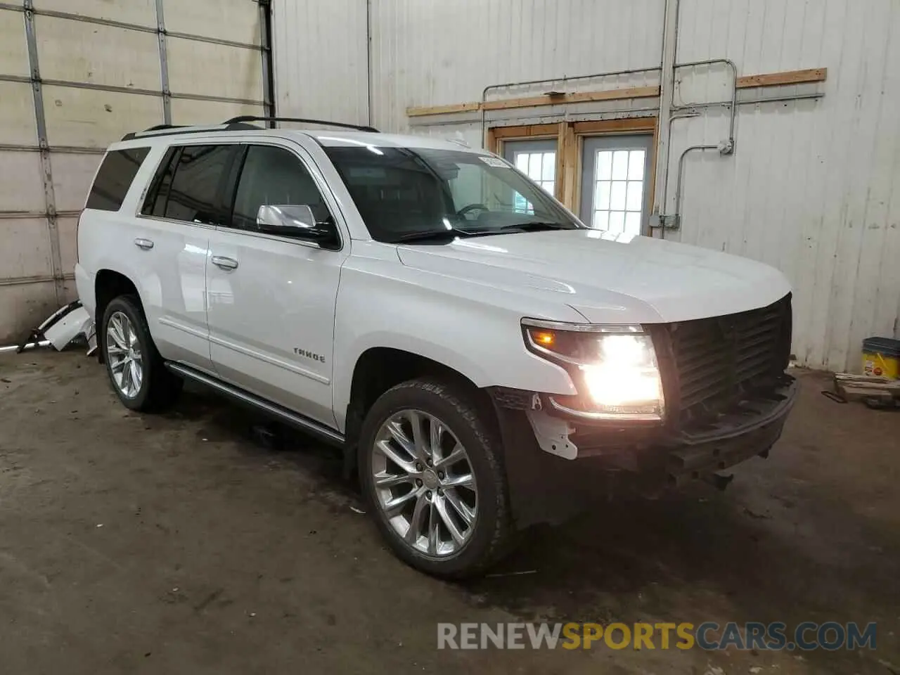 4 Photograph of a damaged car 1GNSKCKJ9KR225873 CHEVROLET TAHOE 2019
