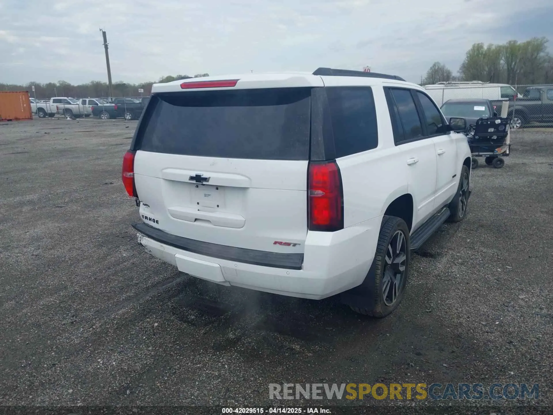 4 Photograph of a damaged car 1GNSKCKJXKR338215 CHEVROLET TAHOE 2019