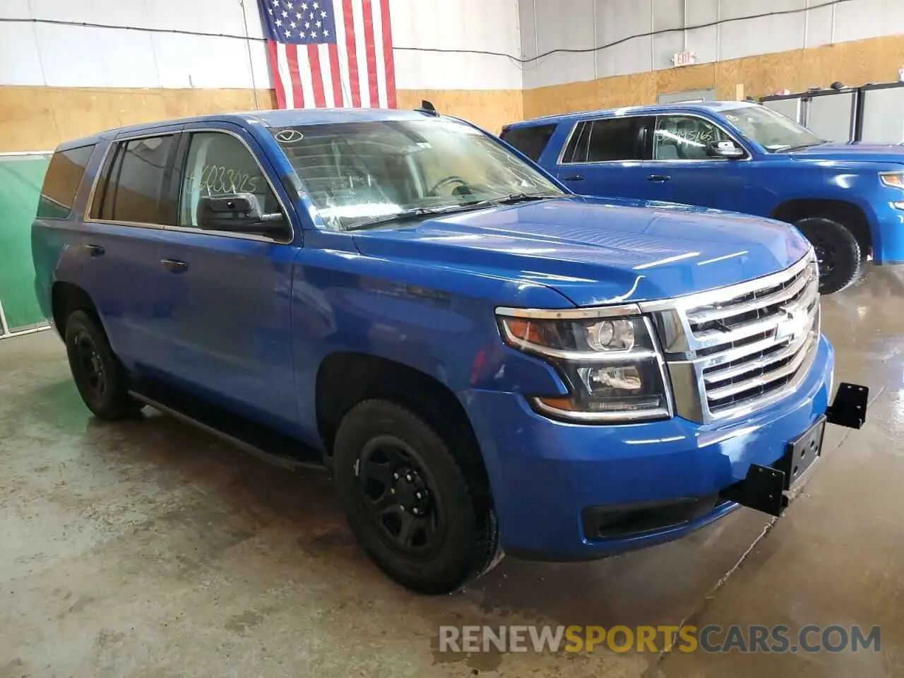 4 Photograph of a damaged car 1GNSKDEC9KR397663 CHEVROLET TAHOE 2019