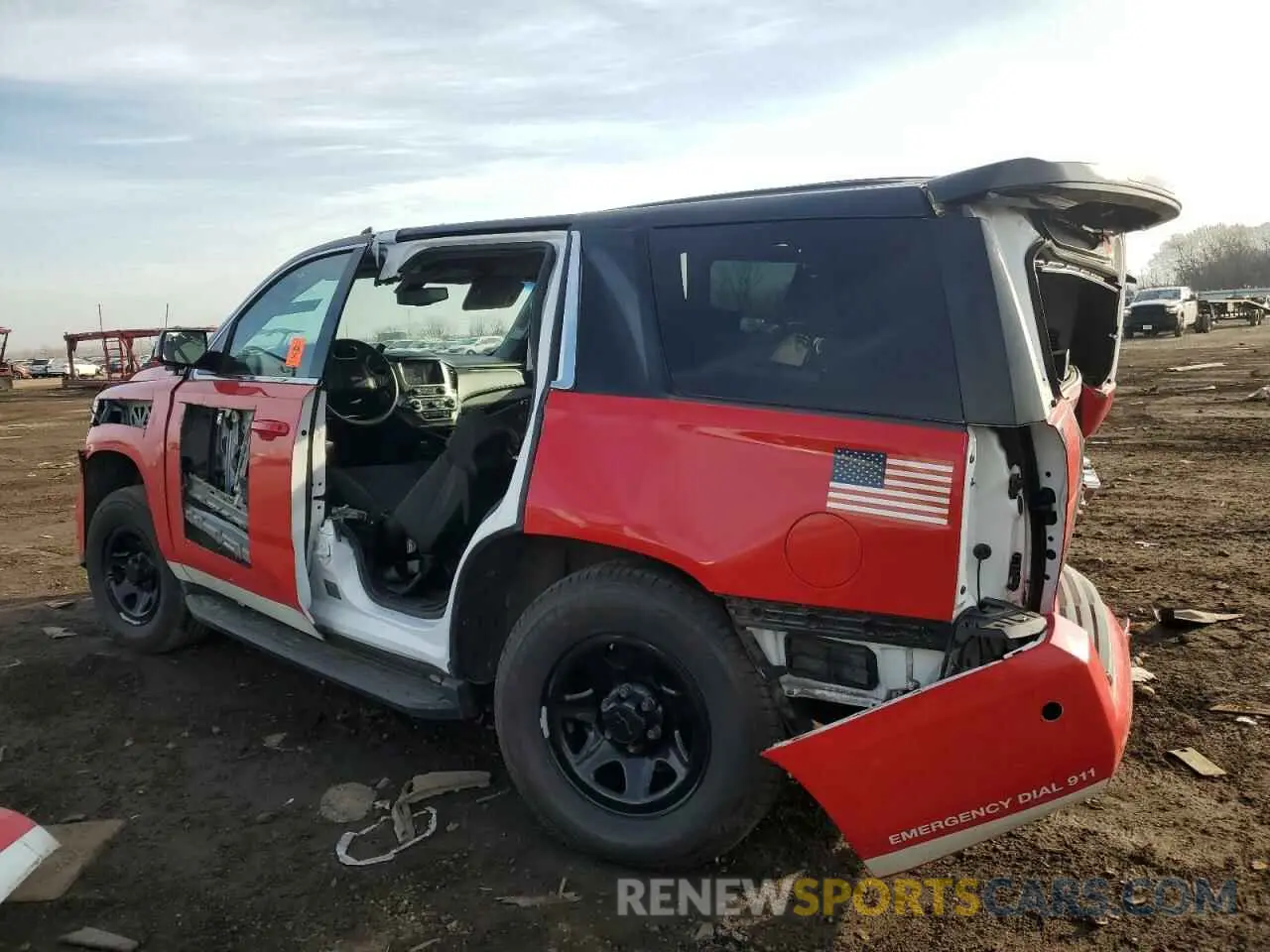 2 Photograph of a damaged car 1GNSKFEC1KR345195 CHEVROLET TAHOE 2019