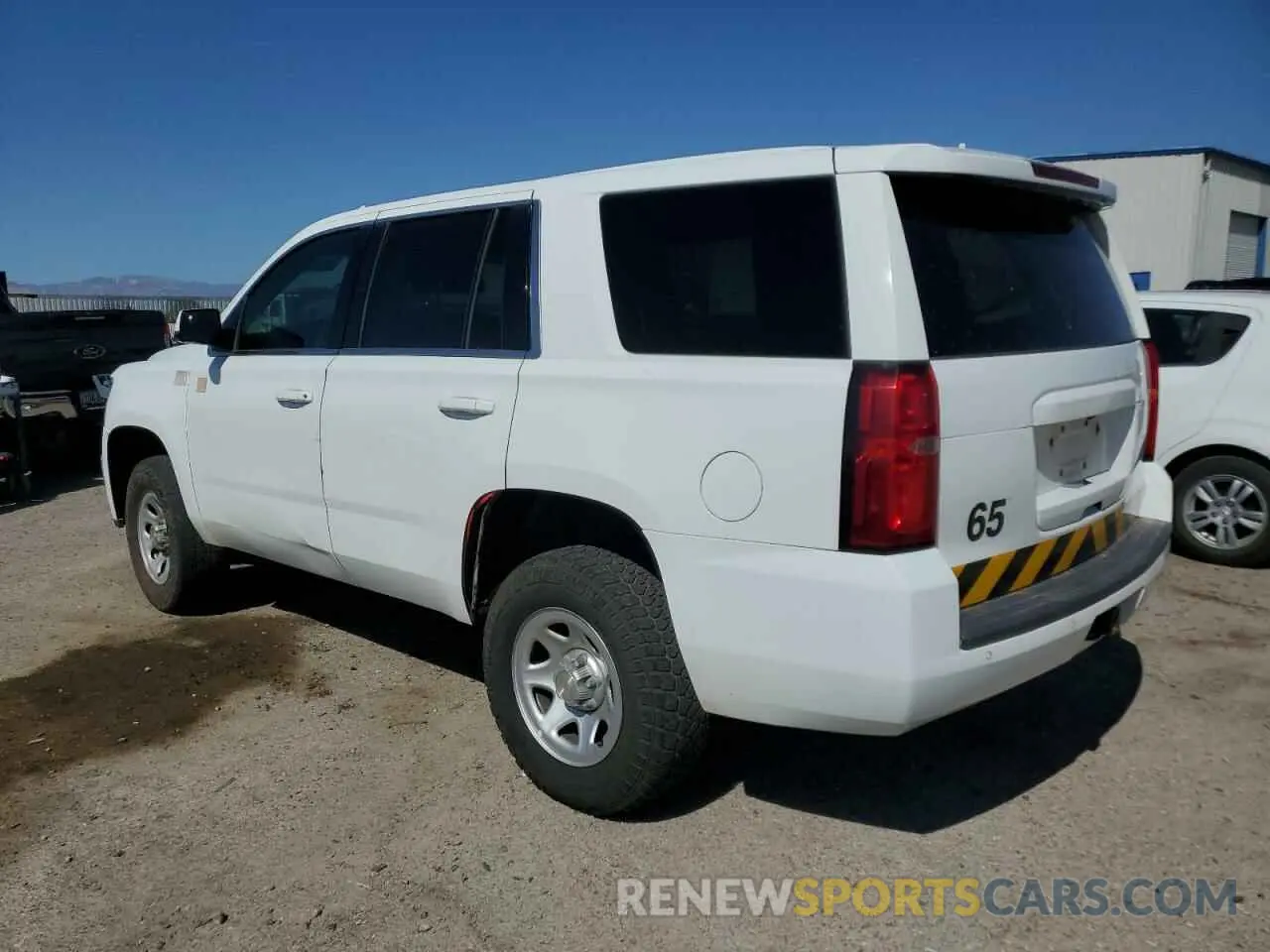 2 Photograph of a damaged car 1GNSKFEC3KR127520 CHEVROLET TAHOE 2019