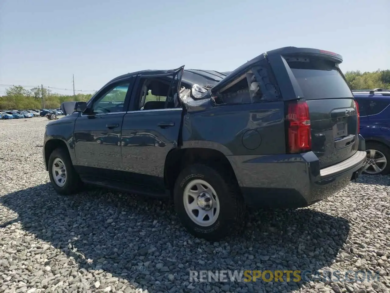 2 Photograph of a damaged car 1GNSKFKC7KR133437 CHEVROLET TAHOE 2019