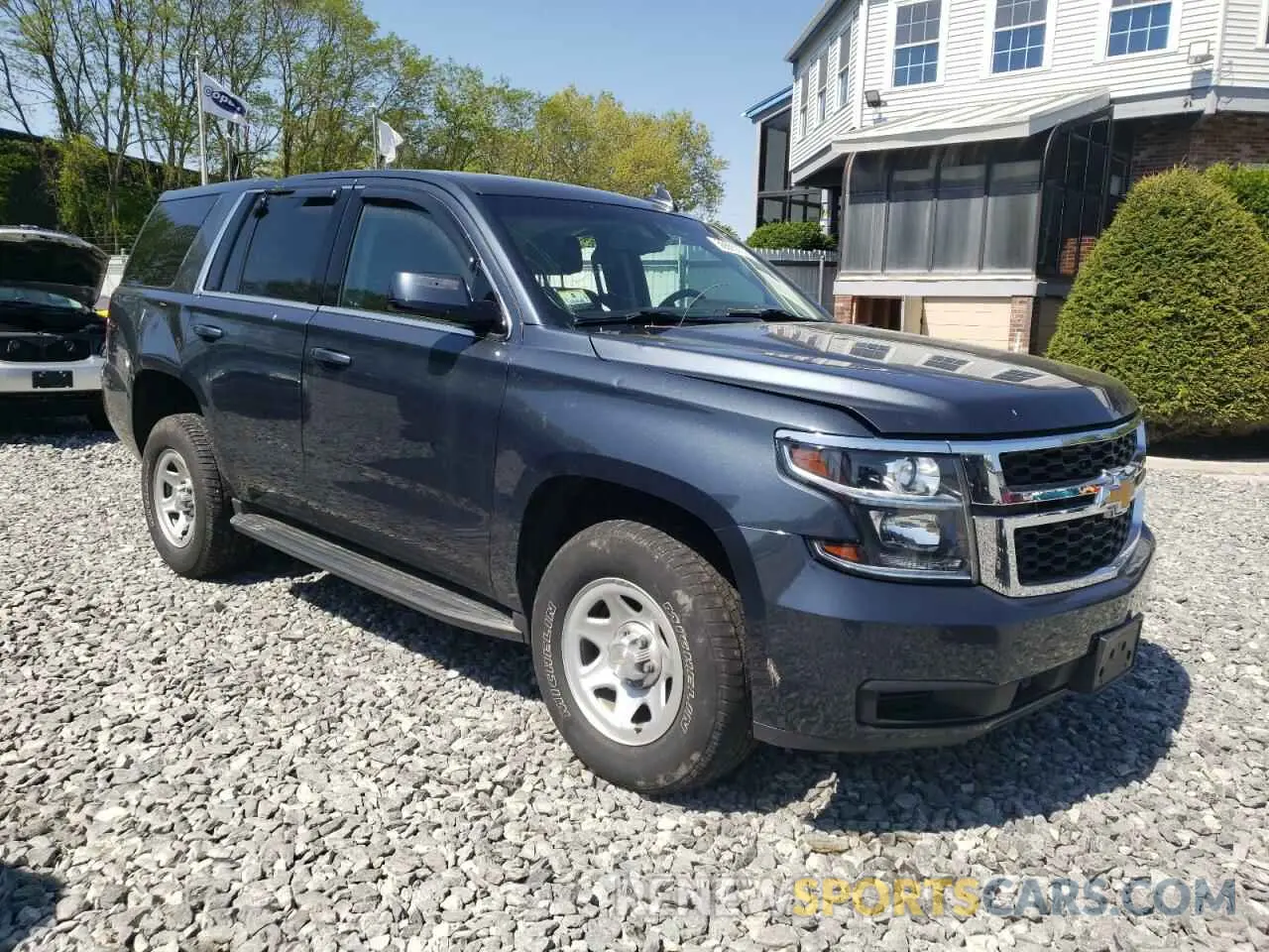 4 Photograph of a damaged car 1GNSKFKC7KR133437 CHEVROLET TAHOE 2019