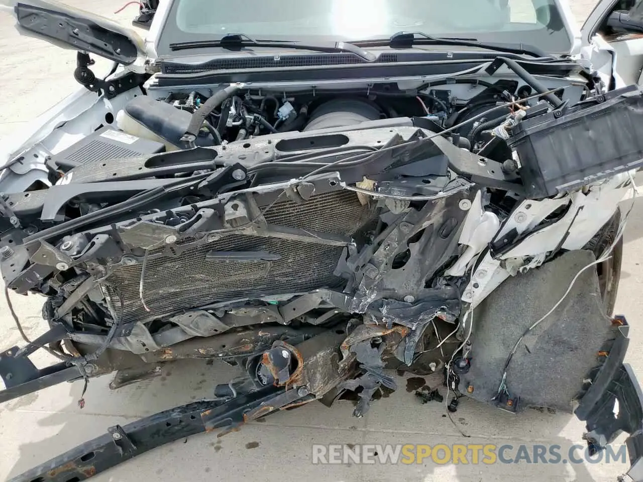 12 Photograph of a damaged car 1GNLCDEC0LR115610 CHEVROLET TAHOE 2020