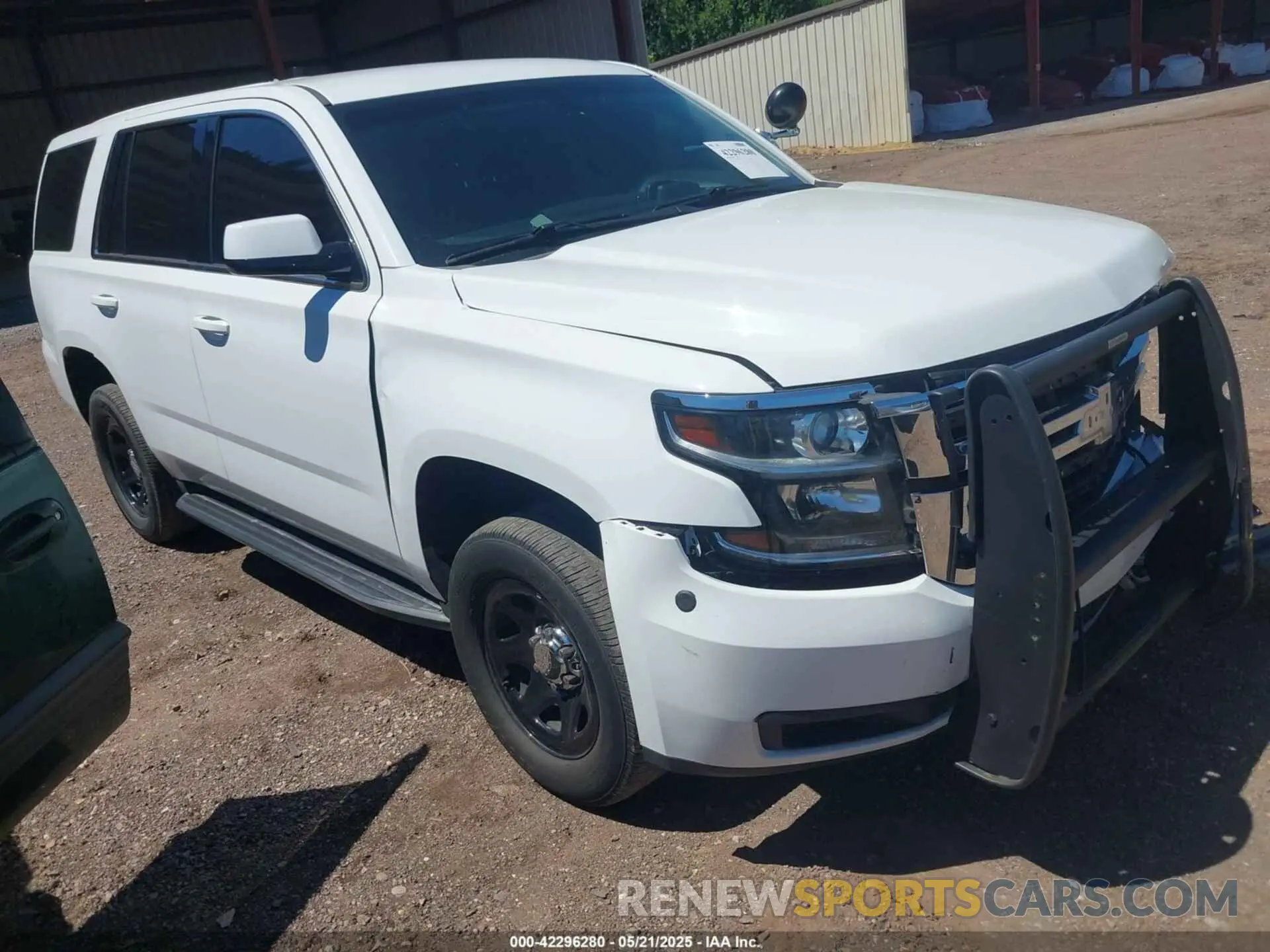 19 Photograph of a damaged car 1GNLCDEC3LR169211 CHEVROLET TAHOE 2020