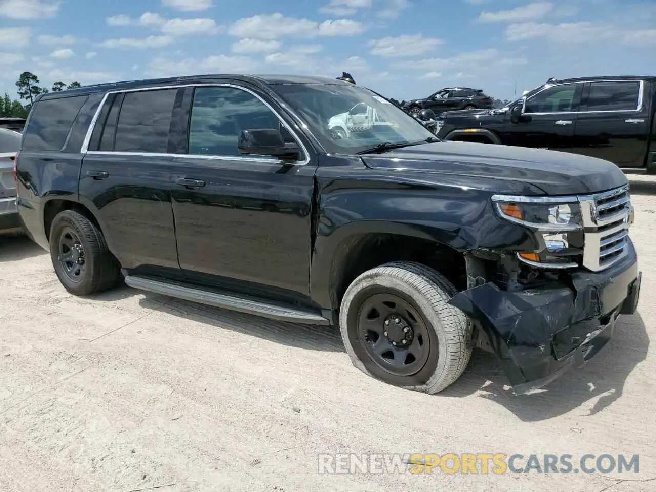 4 Photograph of a damaged car 1GNLCDEC7LR221777 CHEVROLET TAHOE 2020