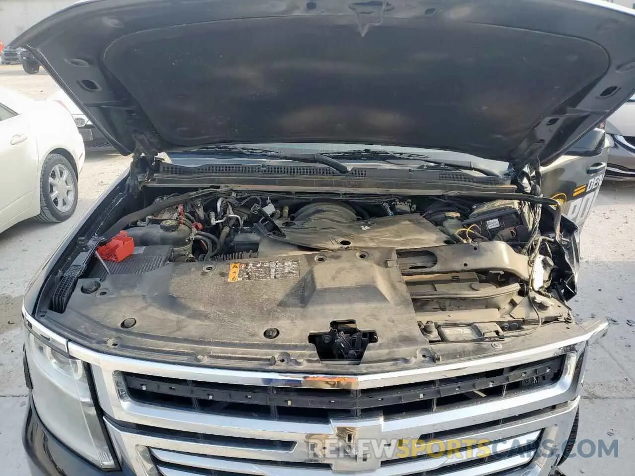 12 Photograph of a damaged car 1GNLCDEC7LR298228 CHEVROLET TAHOE 2020