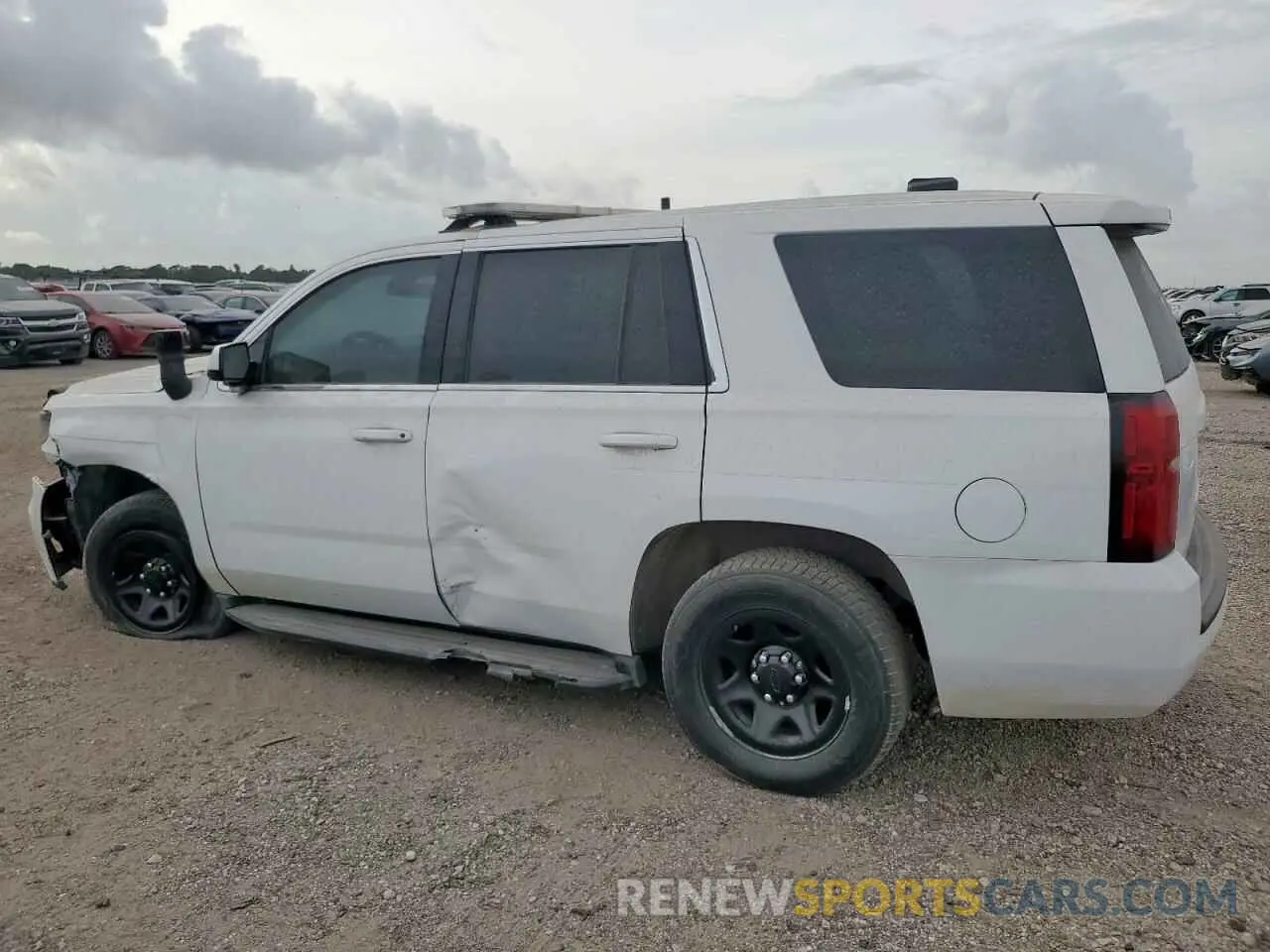 2 Photograph of a damaged car 1GNLCDEC9LR217651 CHEVROLET TAHOE 2020