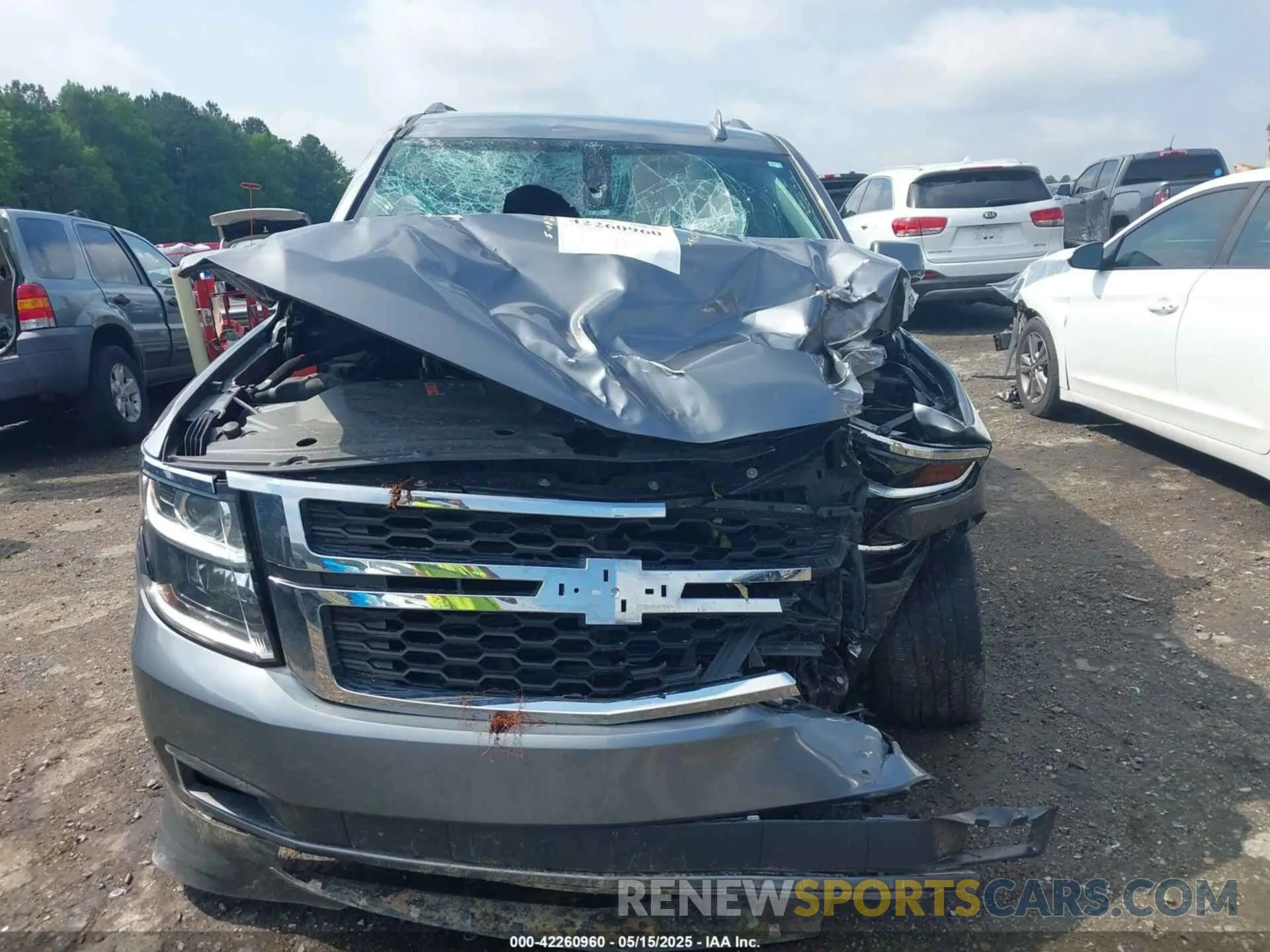 12 Photograph of a damaged car 1GNSCAEC3LR296986 CHEVROLET TAHOE 2020