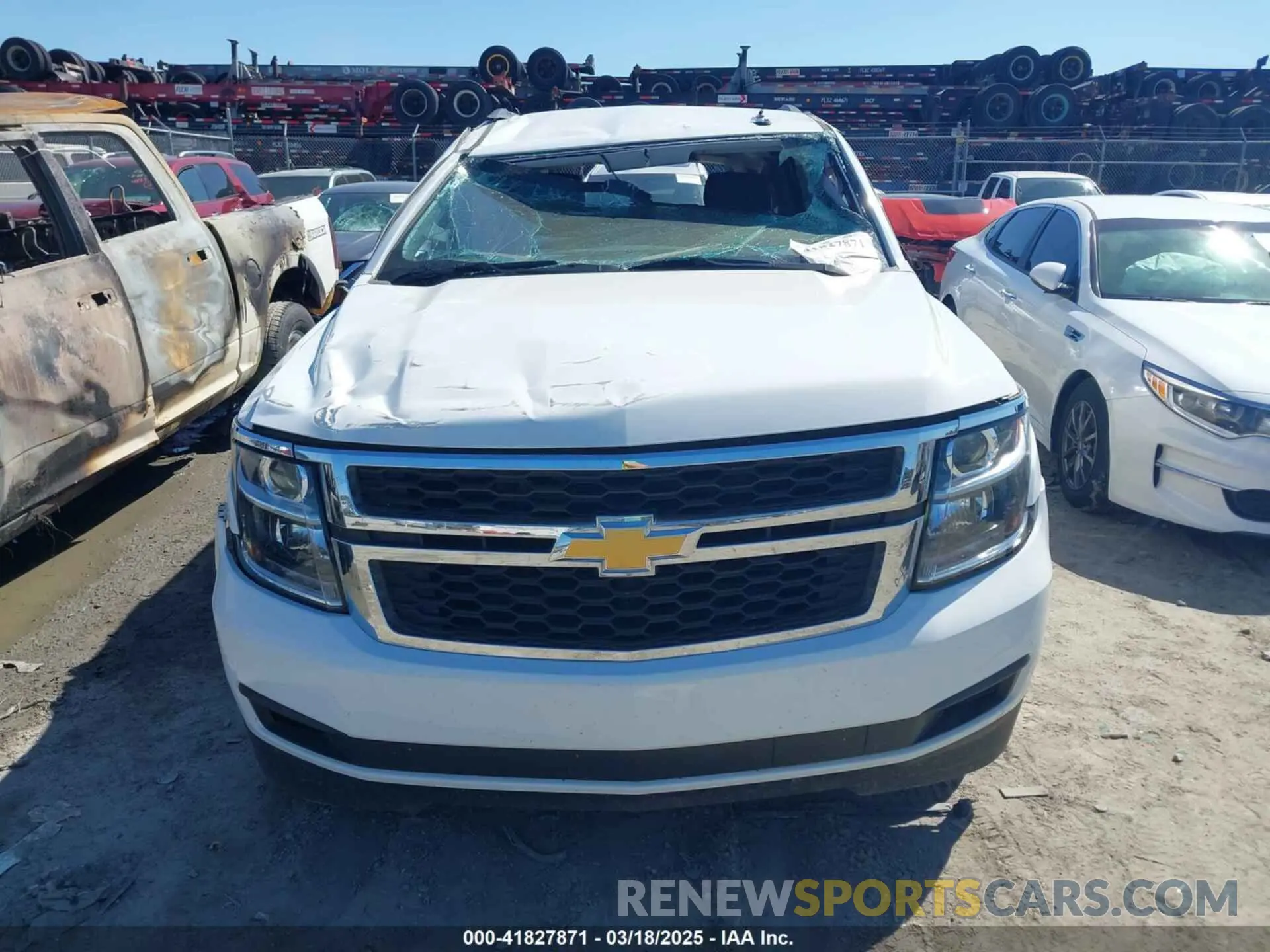 12 Photograph of a damaged car 1GNSCAKC4LR296015 CHEVROLET TAHOE 2020