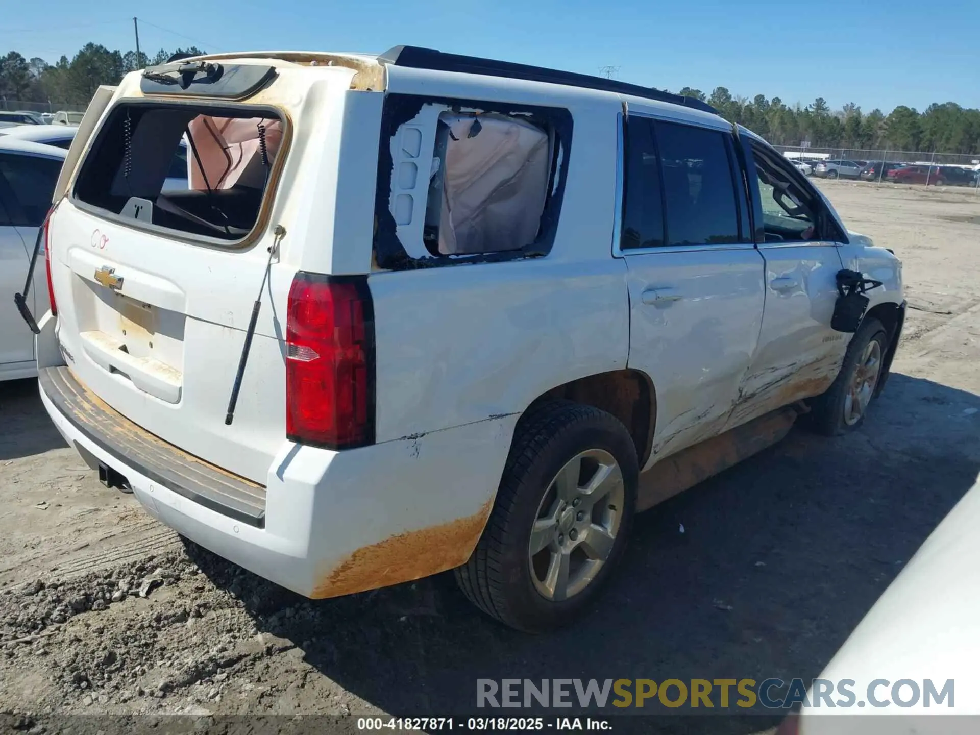 4 Photograph of a damaged car 1GNSCAKC4LR296015 CHEVROLET TAHOE 2020