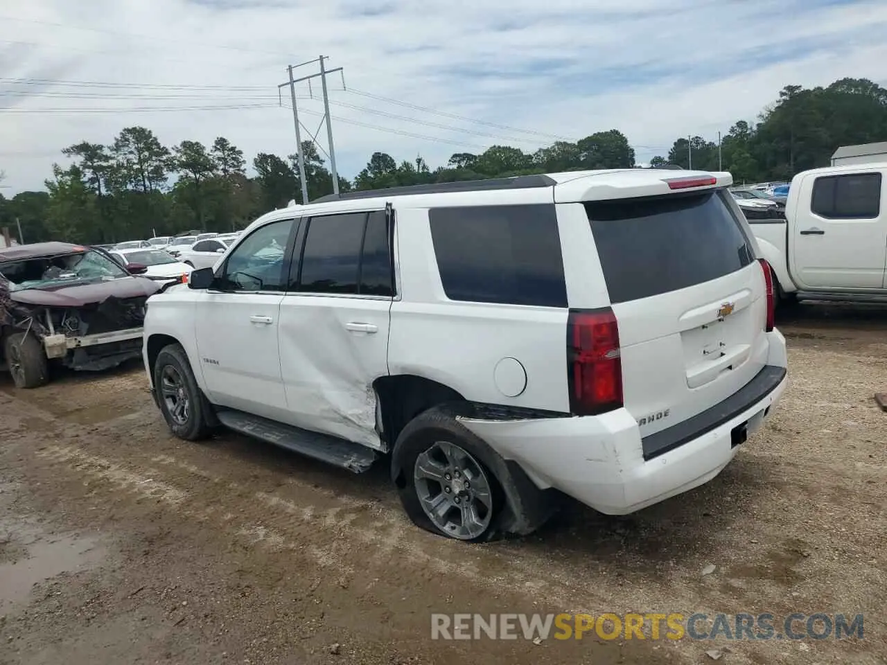 2 Photograph of a damaged car 1GNSCAKC8LR136896 CHEVROLET TAHOE 2020