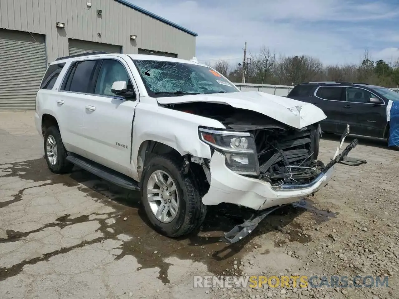 4 Photograph of a damaged car 1GNSCBKC2LR126841 CHEVROLET TAHOE 2020