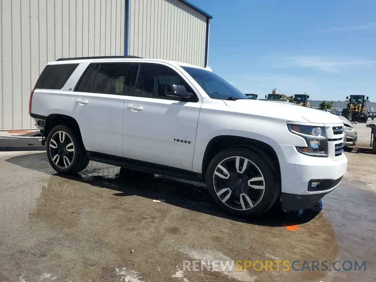 4 Photograph of a damaged car 1GNSCBKC2LR129240 CHEVROLET TAHOE 2020