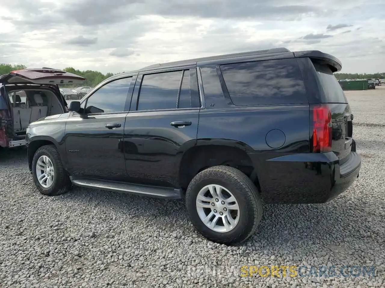 2 Photograph of a damaged car 1GNSCBKC3LR117968 CHEVROLET TAHOE 2020