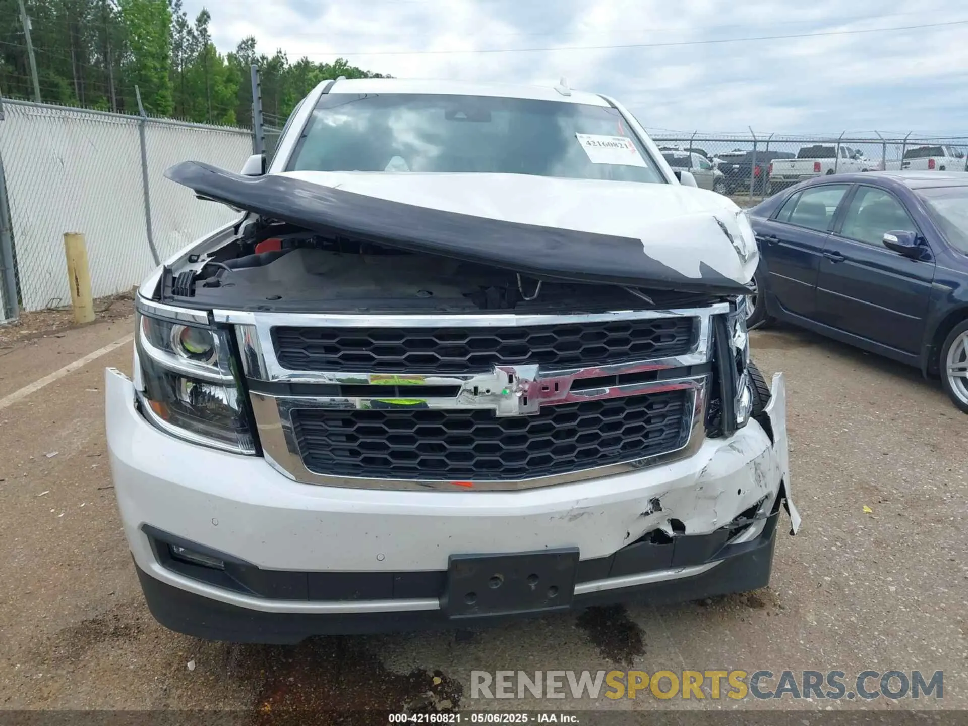 12 Photograph of a damaged car 1GNSCBKC4LR181887 CHEVROLET TAHOE 2020