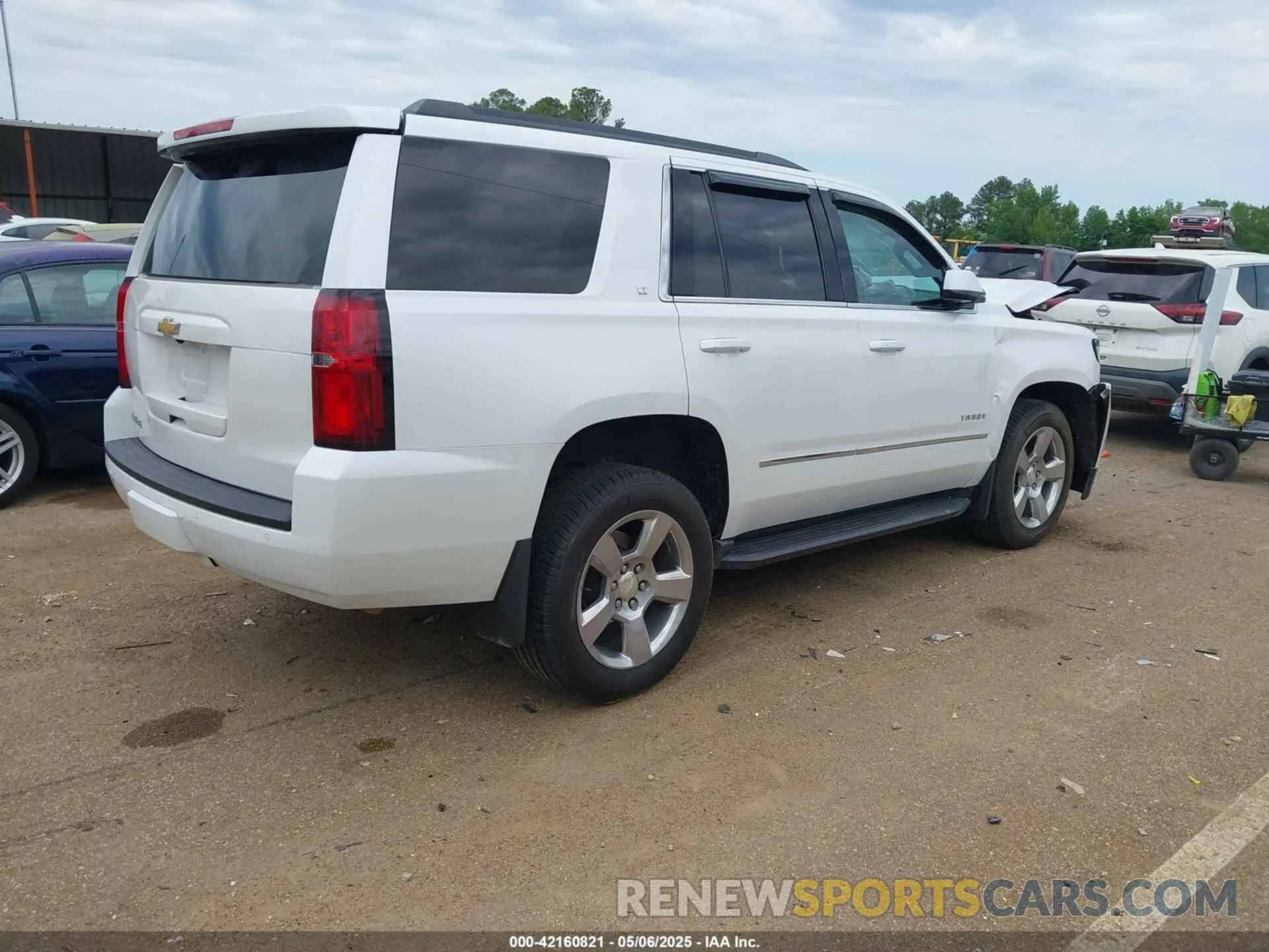 4 Photograph of a damaged car 1GNSCBKC4LR181887 CHEVROLET TAHOE 2020