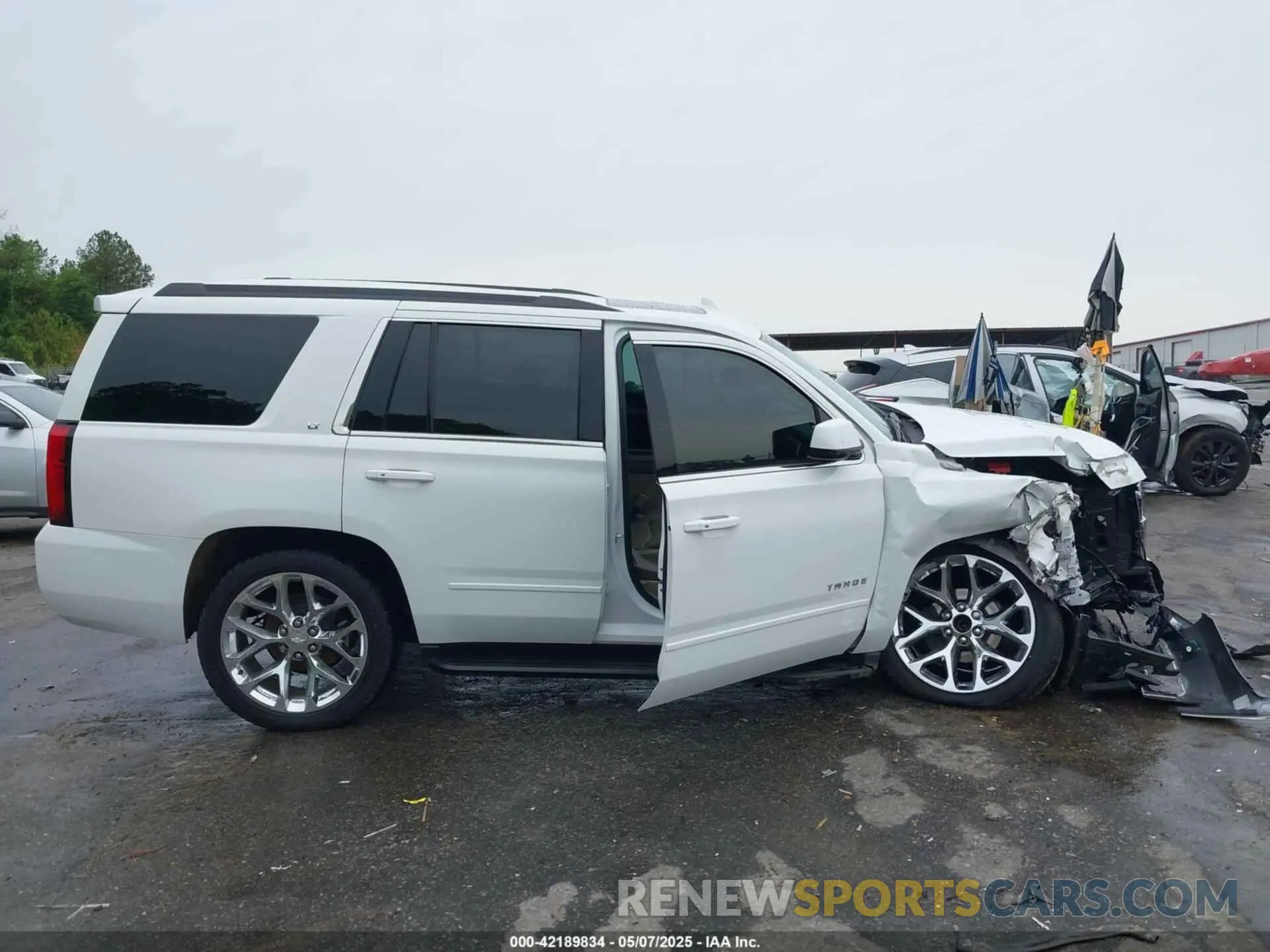 12 Photograph of a damaged car 1GNSCBKC5LR294926 CHEVROLET TAHOE 2020