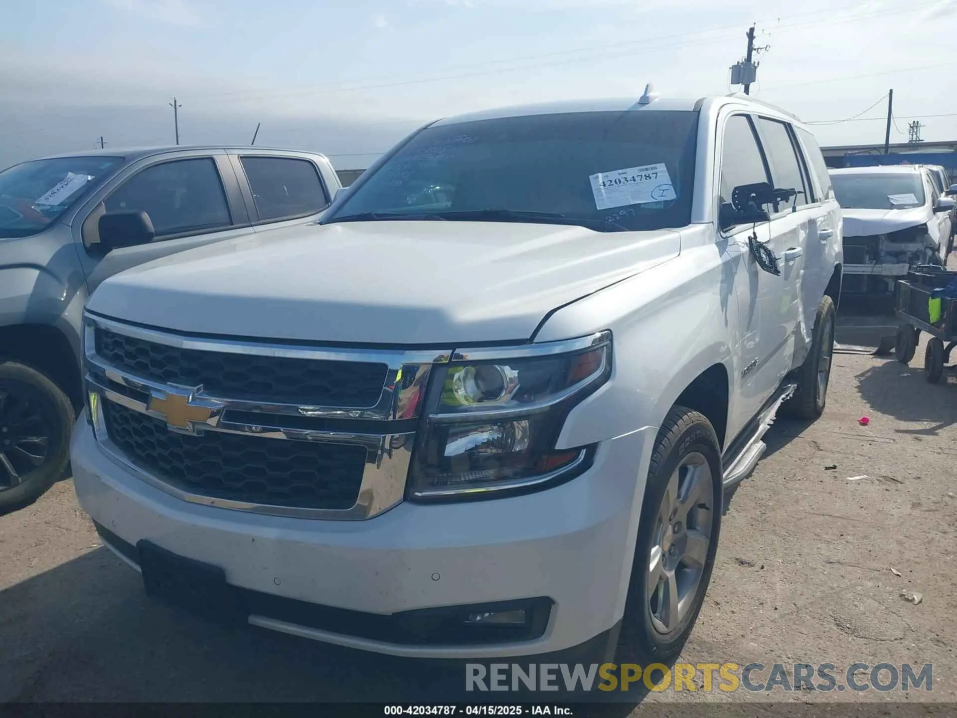 2 Photograph of a damaged car 1GNSCBKC9LR302297 CHEVROLET TAHOE 2020