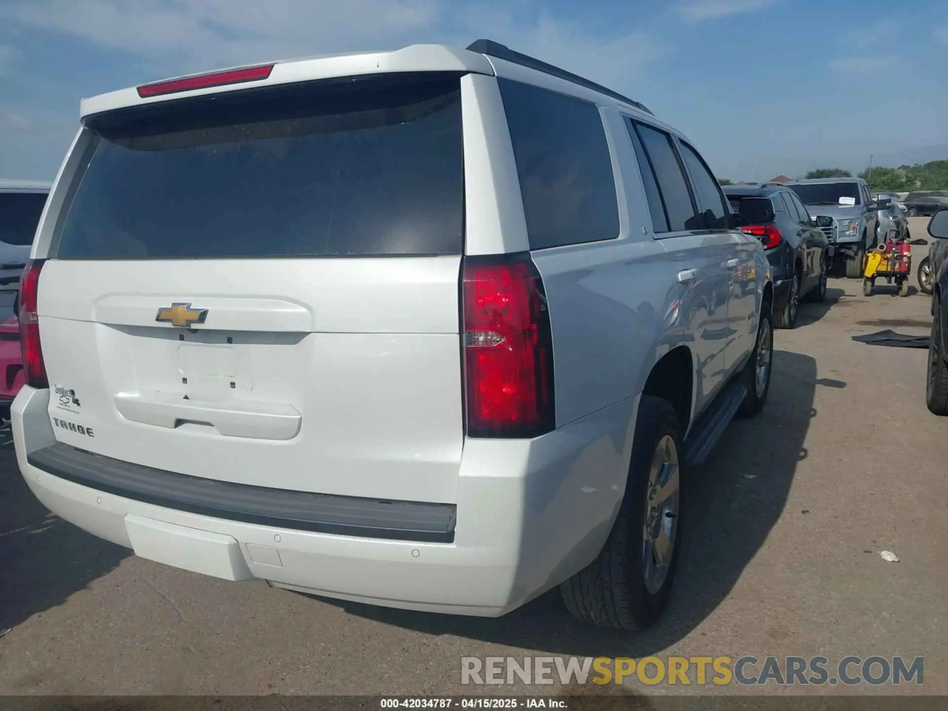 4 Photograph of a damaged car 1GNSCBKC9LR302297 CHEVROLET TAHOE 2020