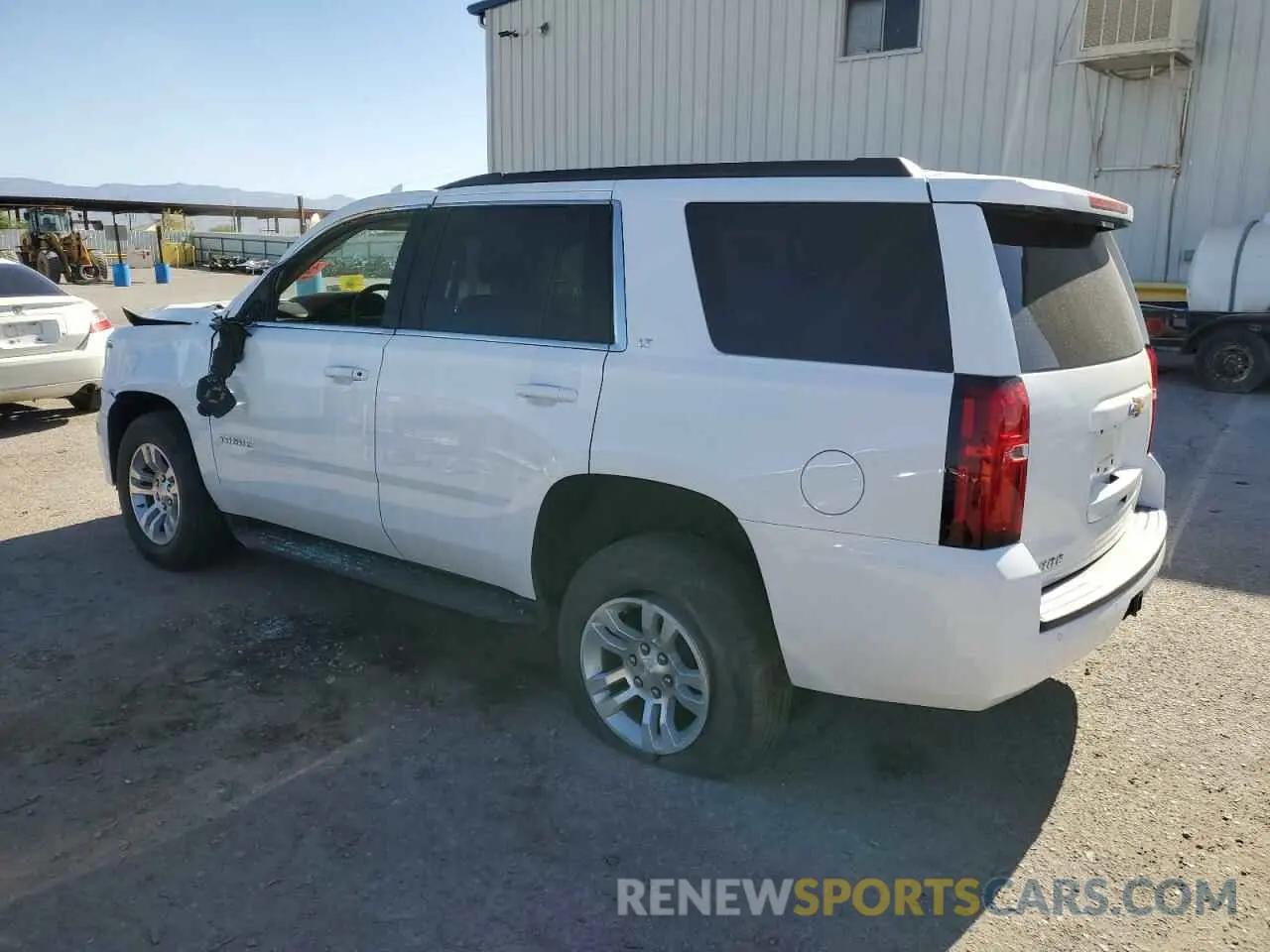 2 Photograph of a damaged car 1GNSKBKC0LR157427 CHEVROLET TAHOE 2020