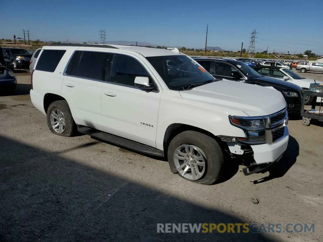 4 Photograph of a damaged car 1GNSKBKC0LR157427 CHEVROLET TAHOE 2020