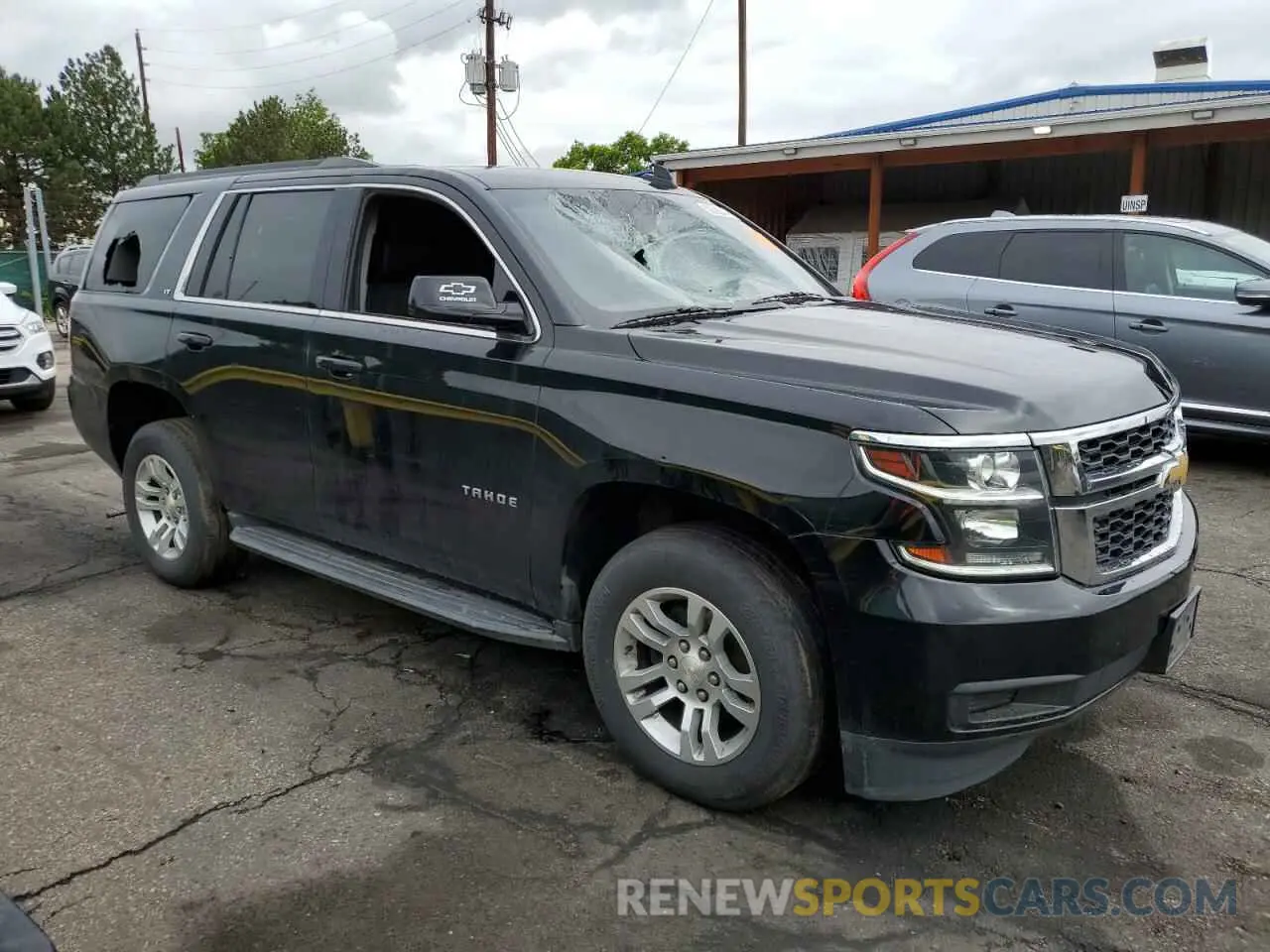 4 Photograph of a damaged car 1GNSKBKC1LR129684 CHEVROLET TAHOE 2020