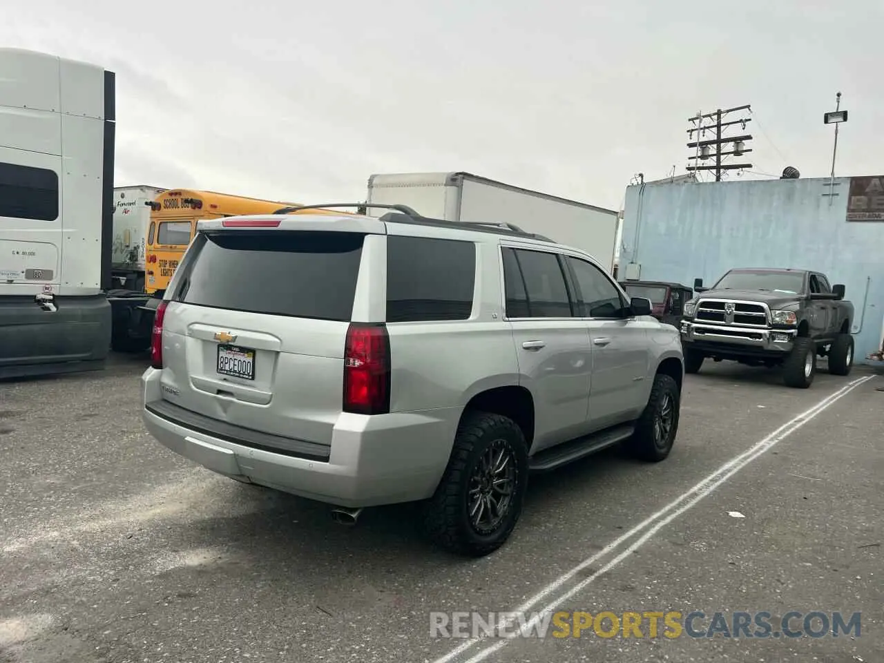 4 Photograph of a damaged car 1GNSKBKC1LR190260 CHEVROLET TAHOE 2020