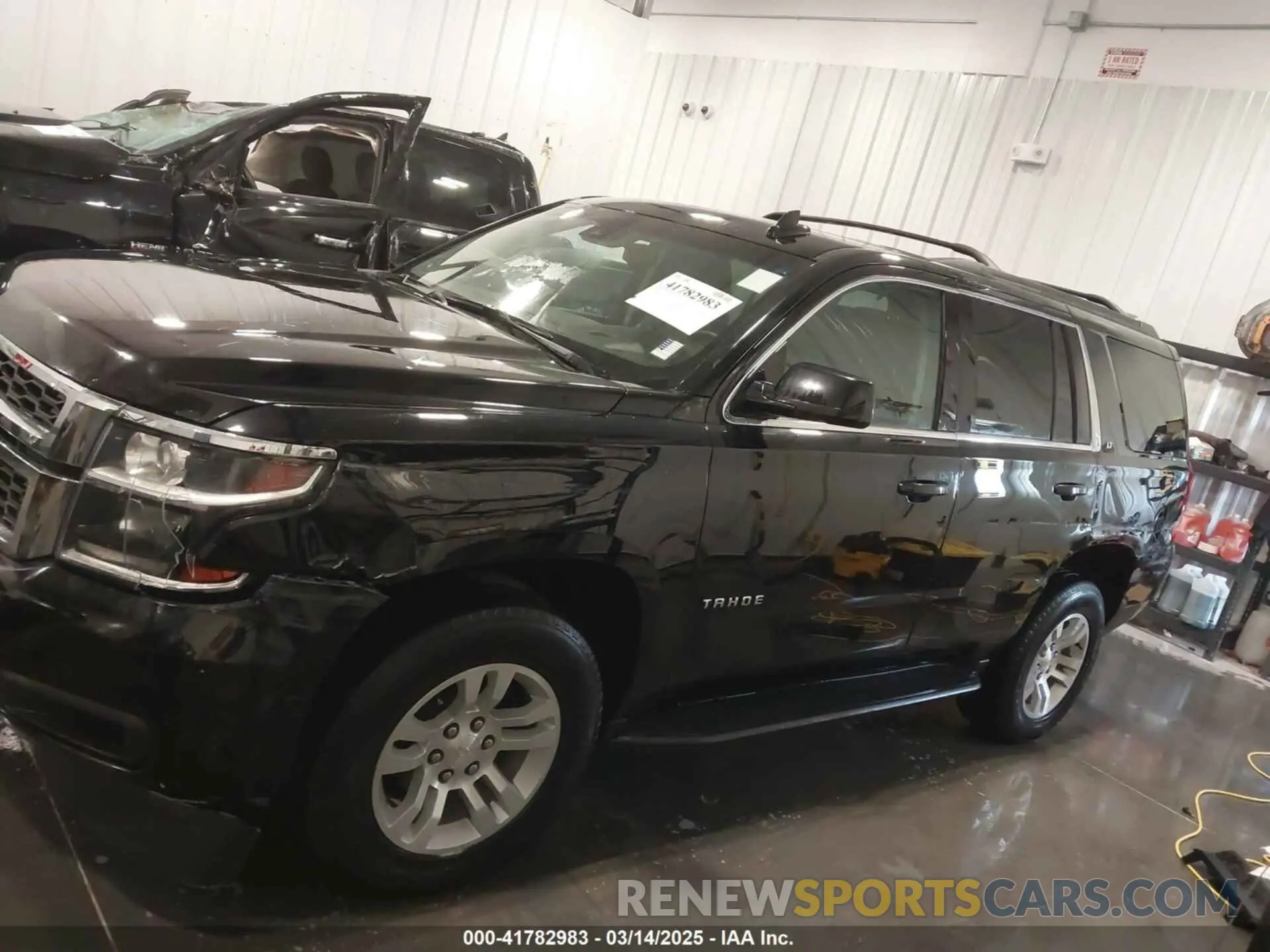 14 Photograph of a damaged car 1GNSKBKC2LR123473 CHEVROLET TAHOE 2020