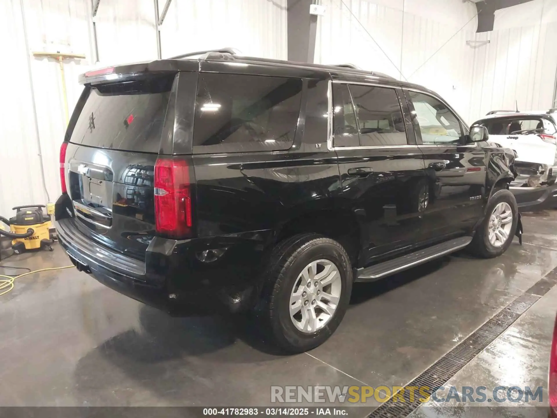 4 Photograph of a damaged car 1GNSKBKC2LR123473 CHEVROLET TAHOE 2020