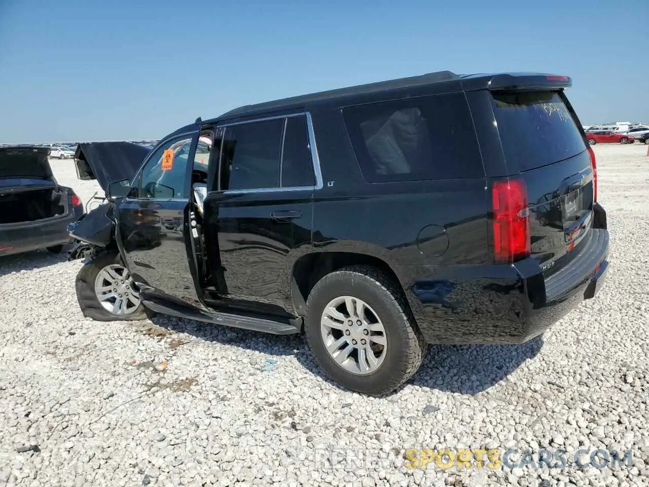 2 Photograph of a damaged car 1GNSKBKC4LR275254 CHEVROLET TAHOE 2020