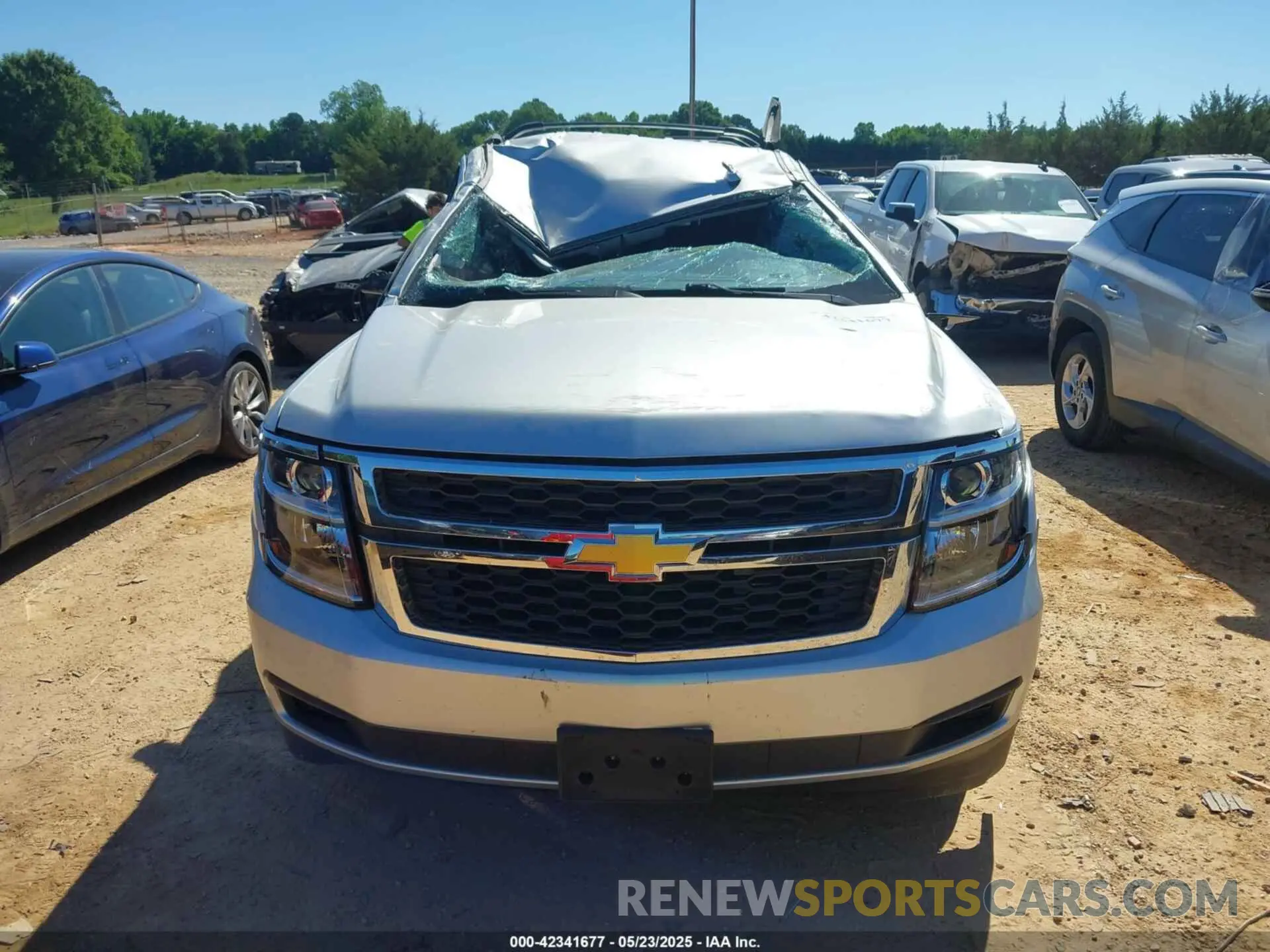 12 Photograph of a damaged car 1GNSKBKC5LR121085 CHEVROLET TAHOE 2020