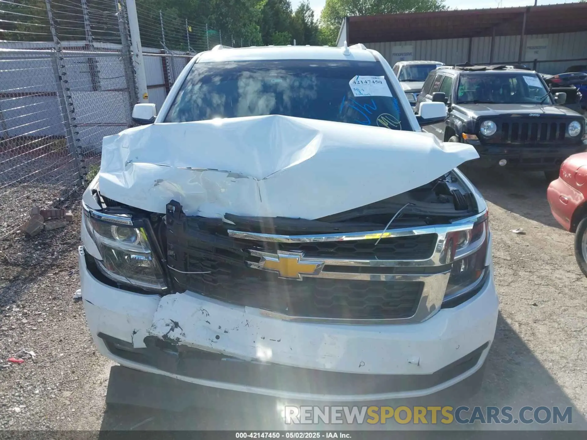12 Photograph of a damaged car 1GNSKBKC7LR276771 CHEVROLET TAHOE 2020