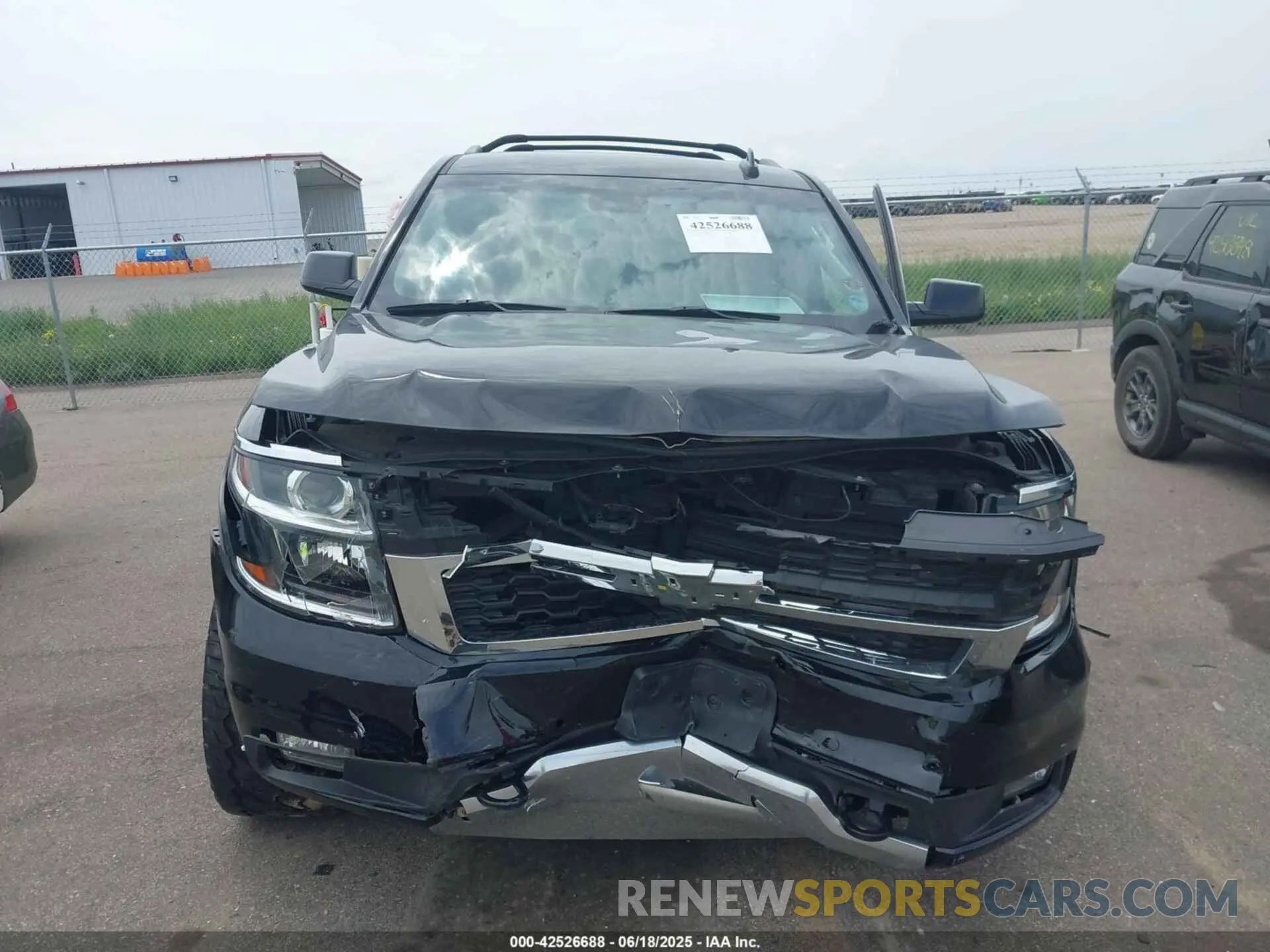 12 Photograph of a damaged car 1GNSKBKC9LR129187 CHEVROLET TAHOE 2020
